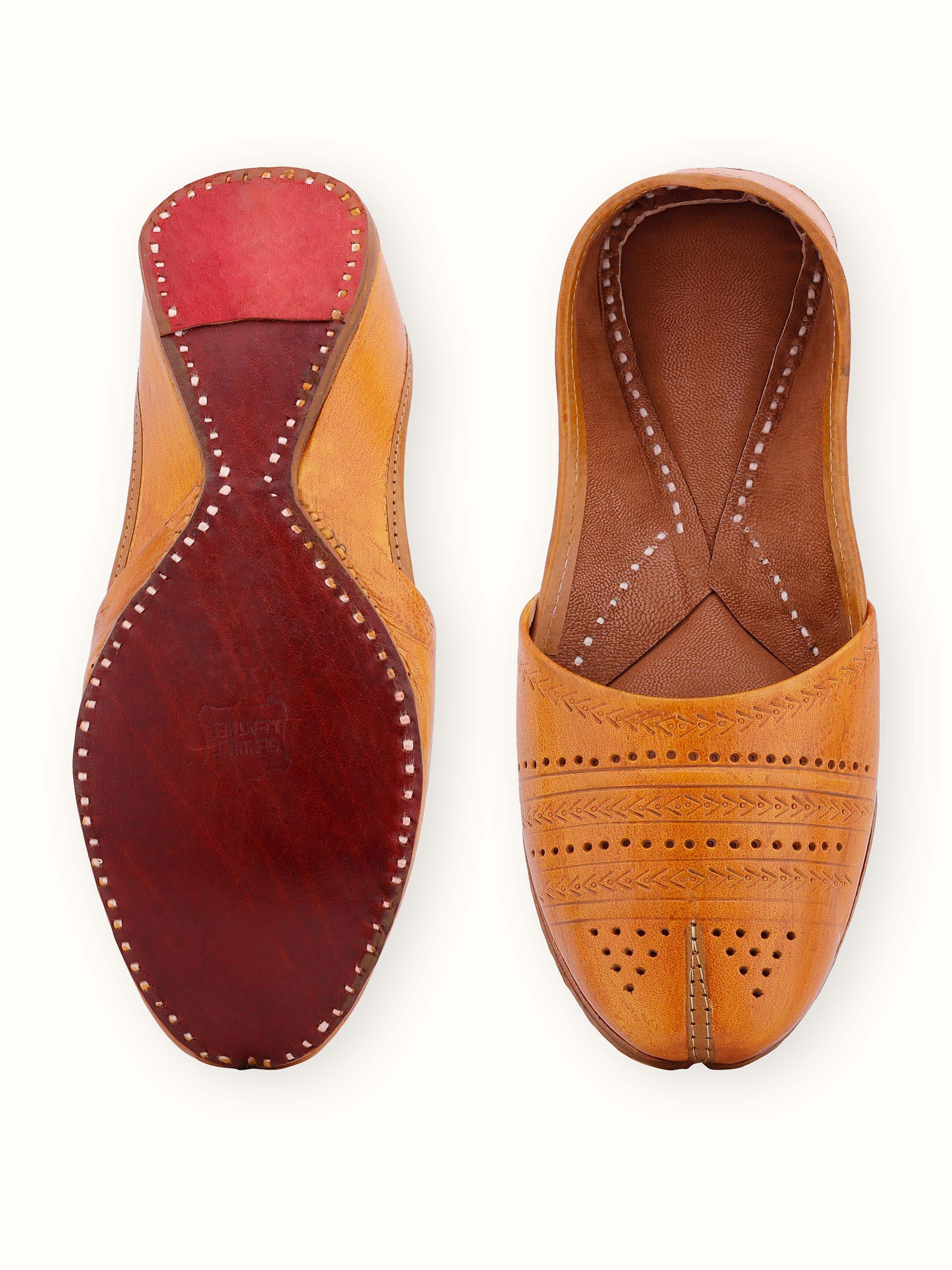Top view of Tan Leather Haryana Punjabi Juttis showing the overall shape and design details.