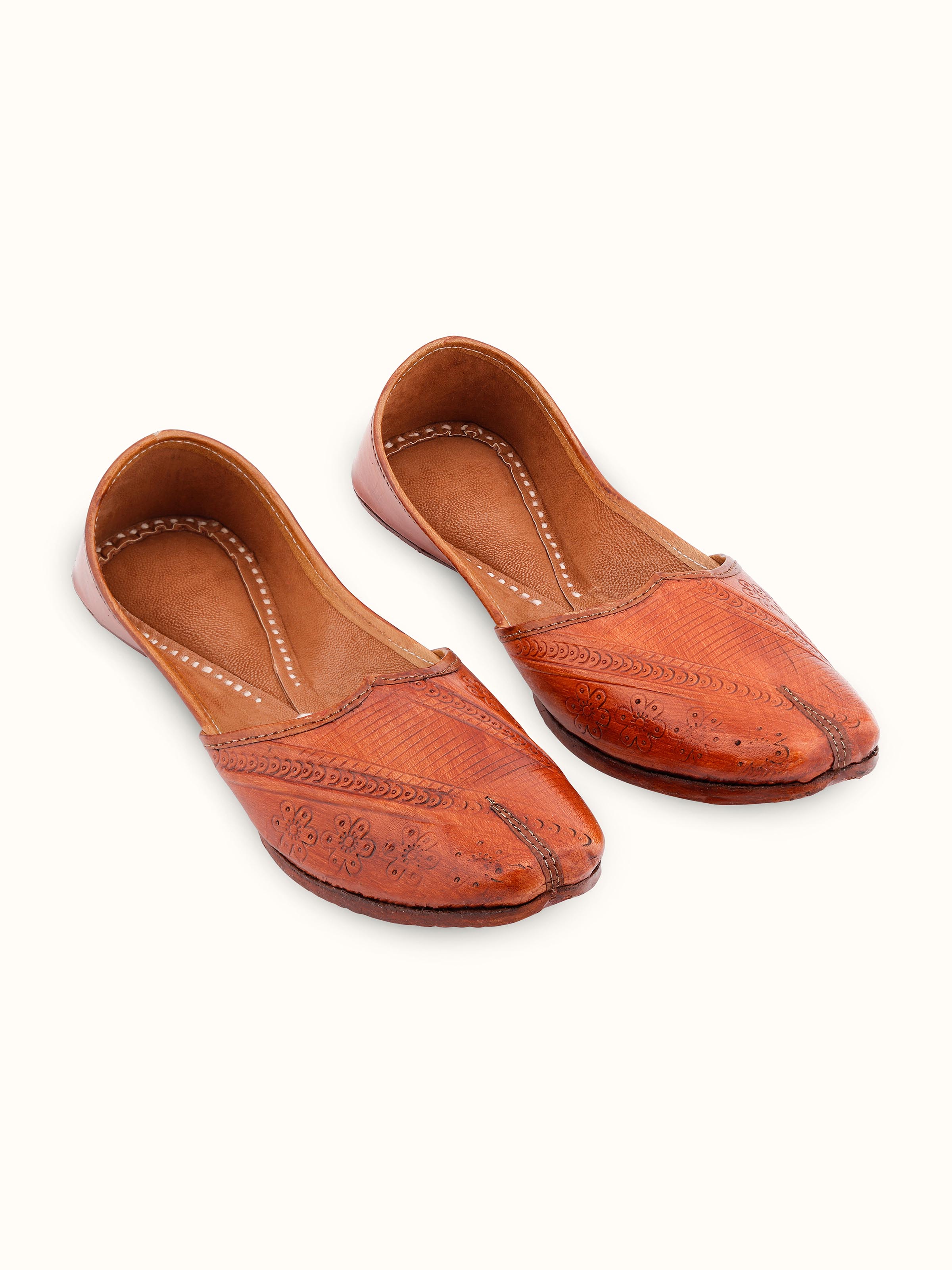 Front view of Tan Leather Haryana Punjabi Juttis displaying the traditional design and leather finish.