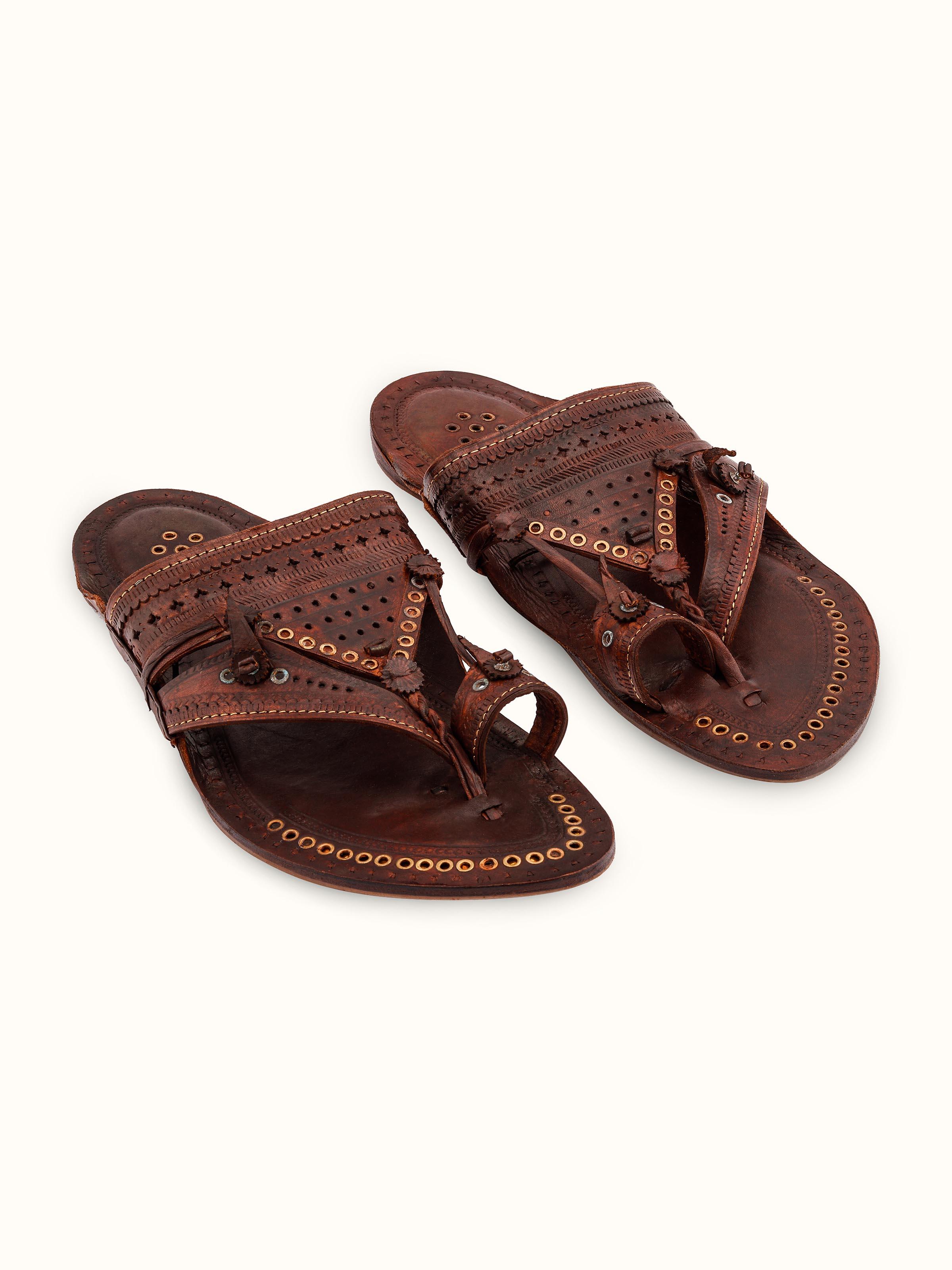 Front view of tan leather Kolhapuri chappals showcasing traditional design