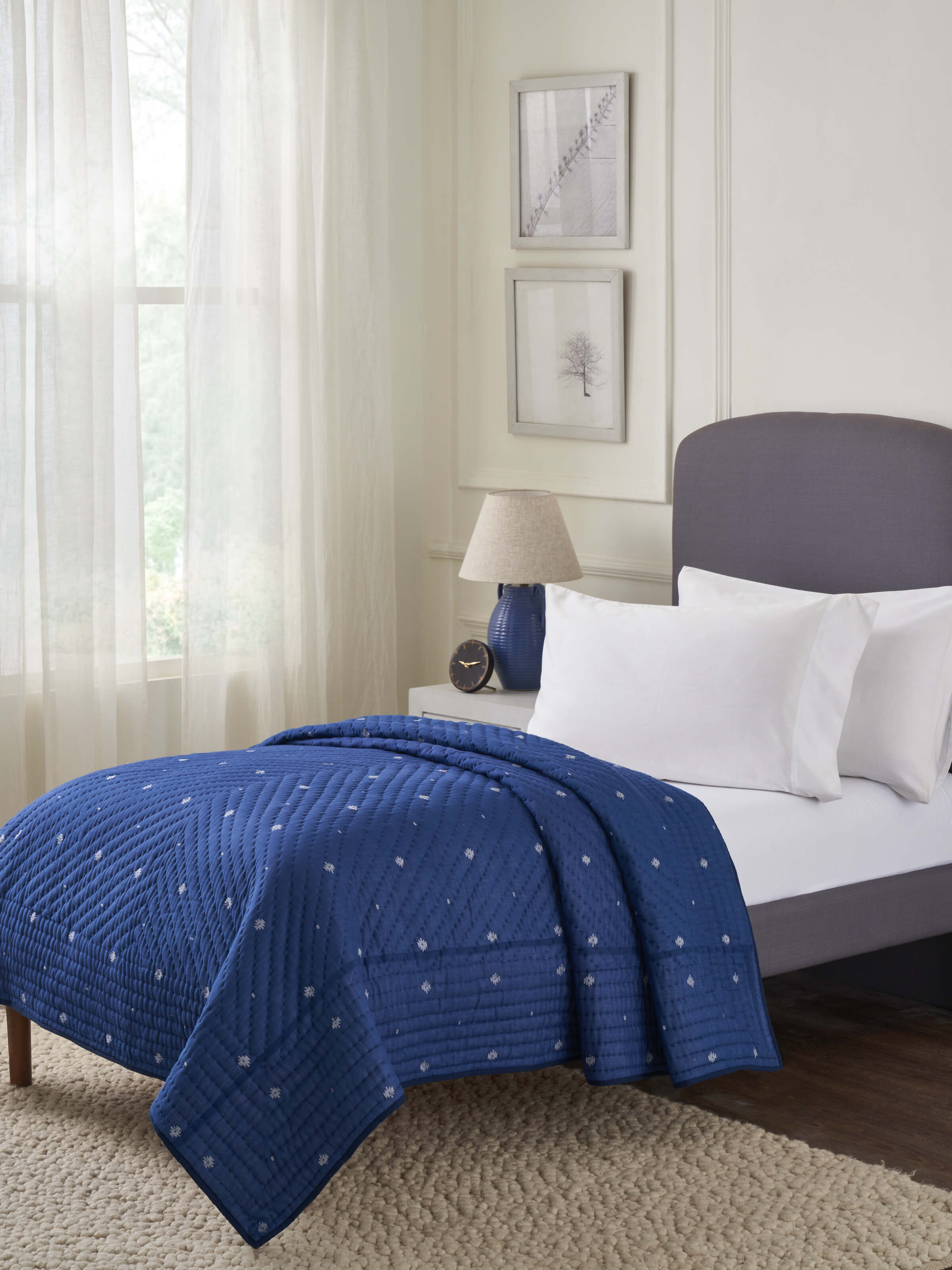 Full view of Kalpanama Indigo Woven Buti Cotton Single Quilt, showcasing the indigo color and woven pattern.