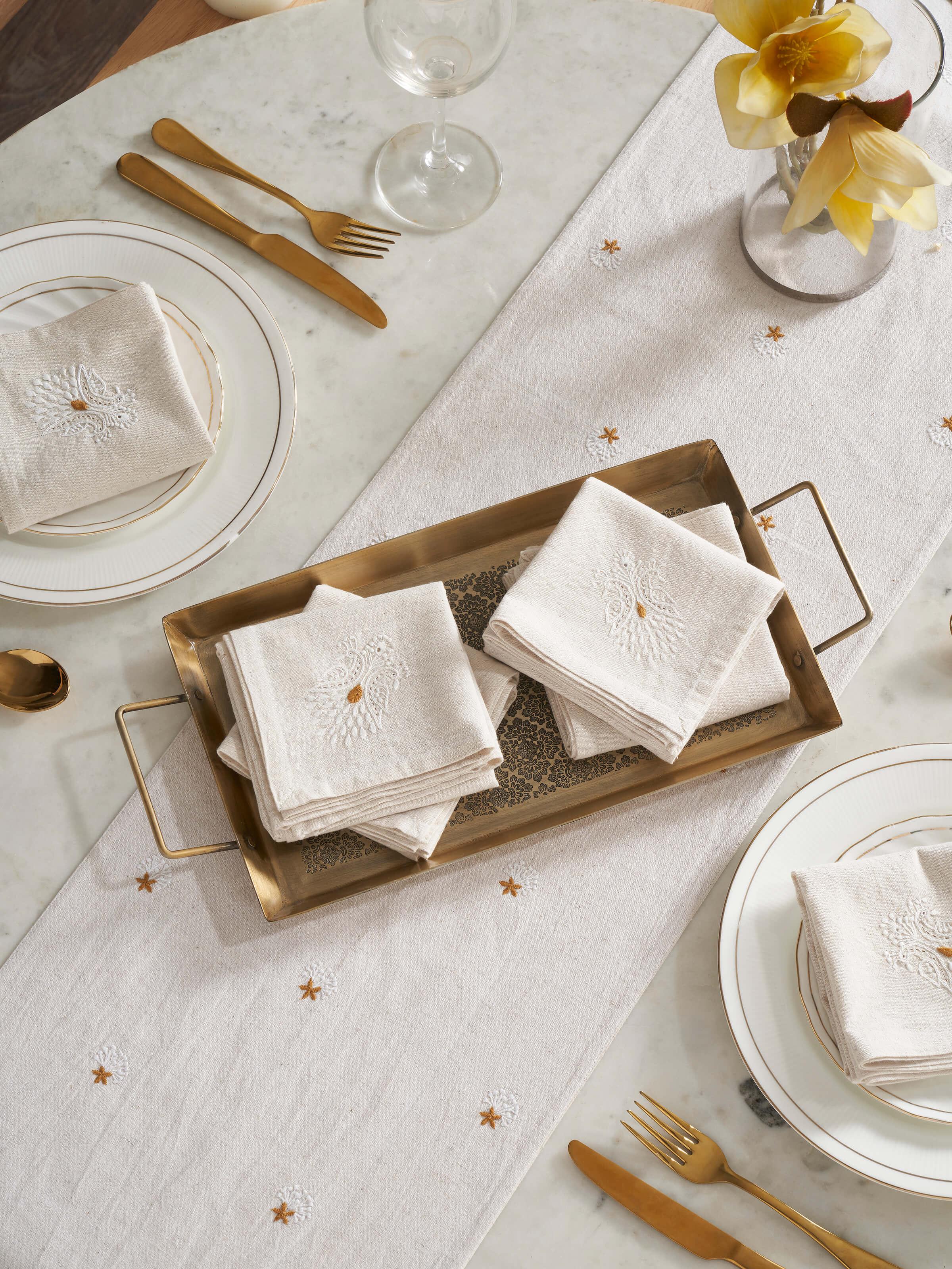 Close-up of Iti mustard floral cotton flax Chikankari dinner napkins (6 pcs) highlighting the intricate embroidery and fabric texture
