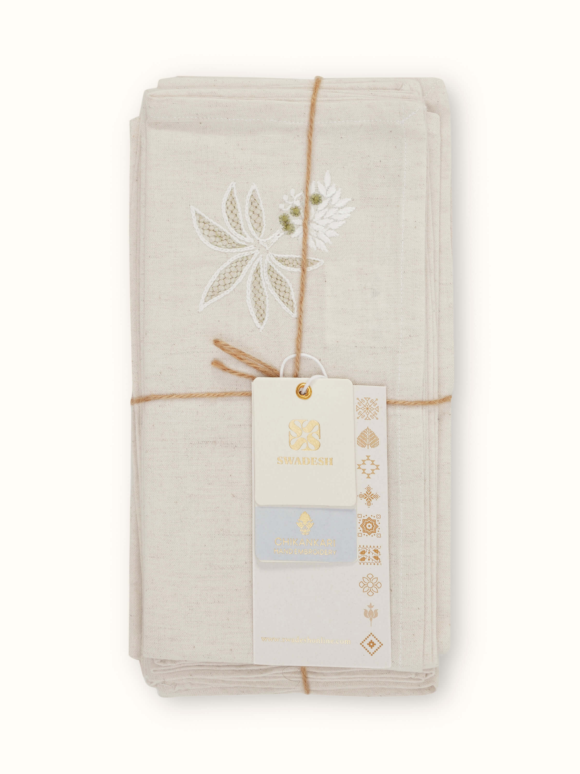 Close-up of Kadal green floral cotton flax Chikankari dinner napkins (6 pcs) with focus on the fine Chikankari embroidery and floral design.