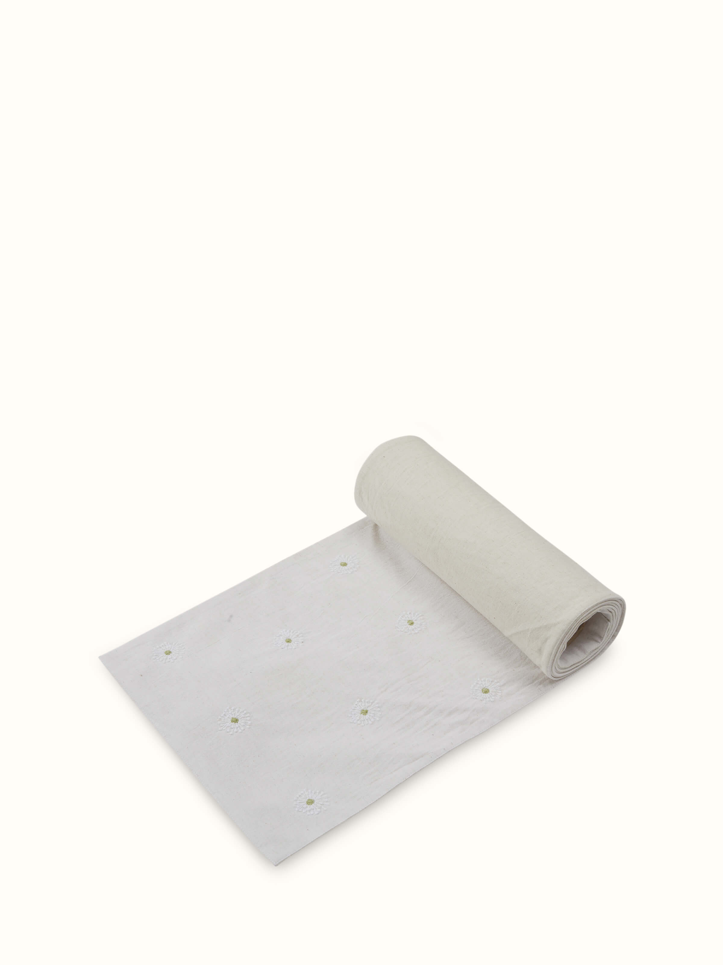 Angled view of table runner showing full length and elegant fall.