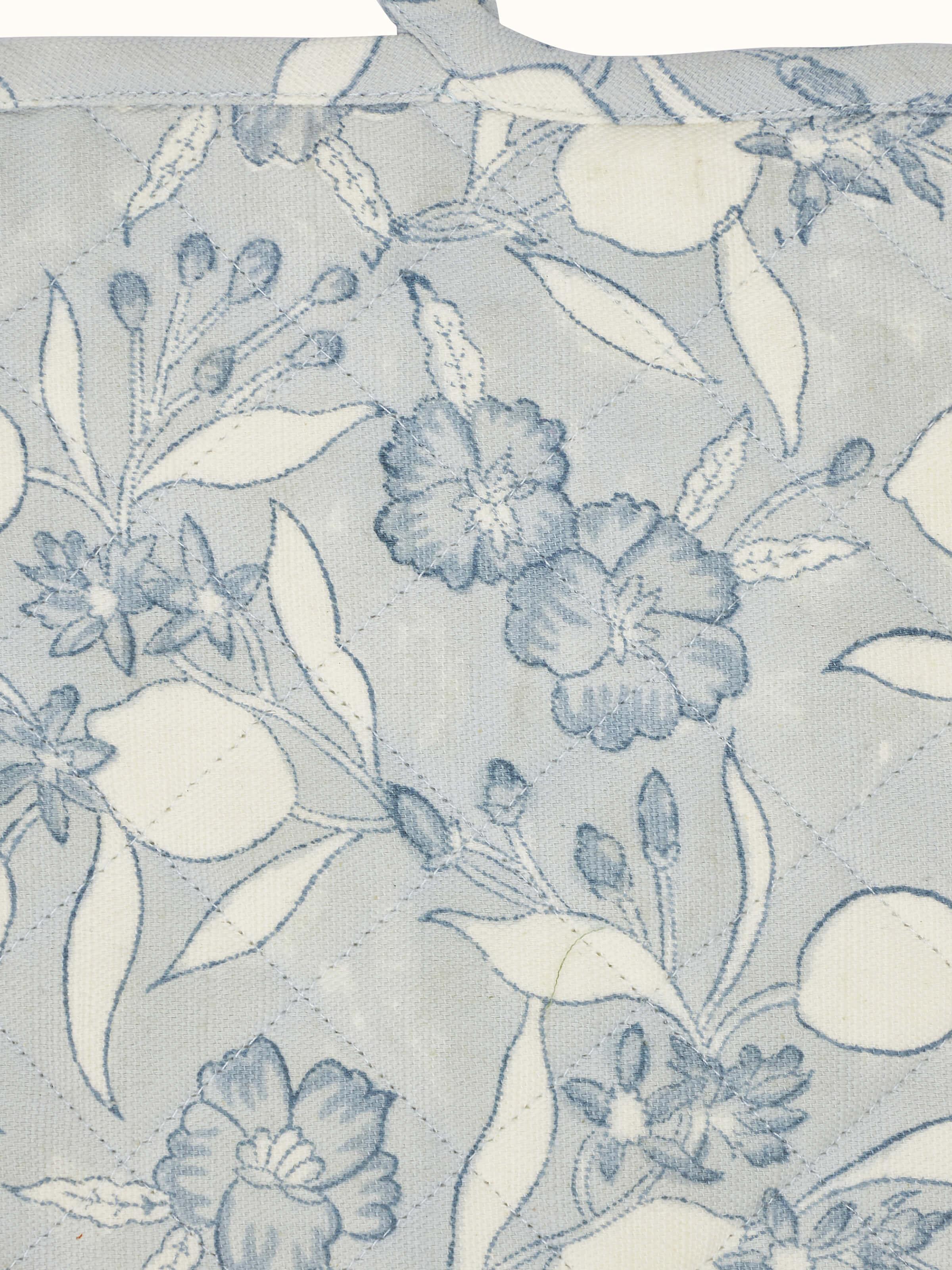 Full view of Anika light blue floral cotton Sanganeri block printed pot holder displaying the overall design and color.