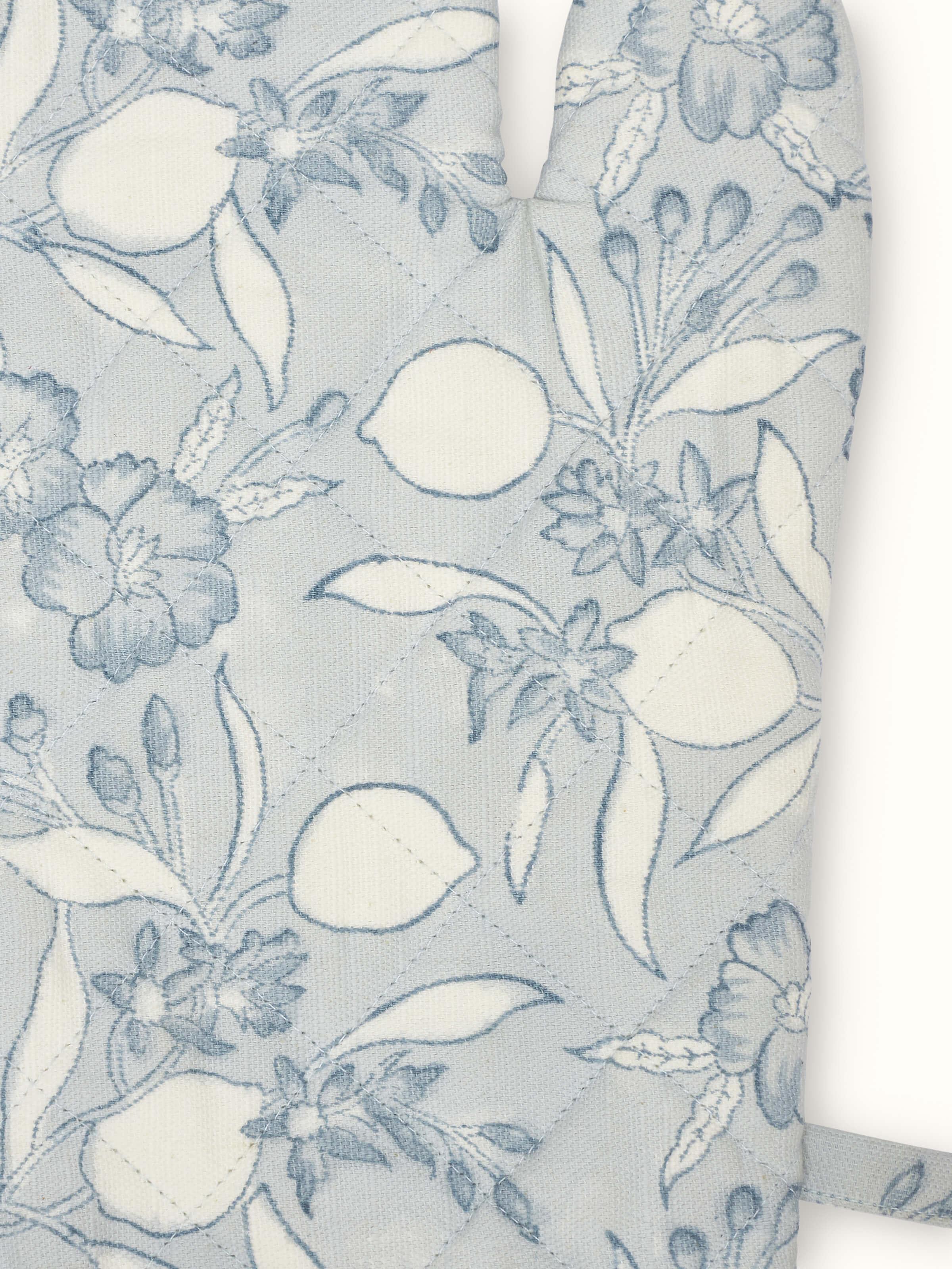 Angled view of Anika Light Blue Floral Cotton Sanganeri Block Printed Oven Mitts showing overall pattern