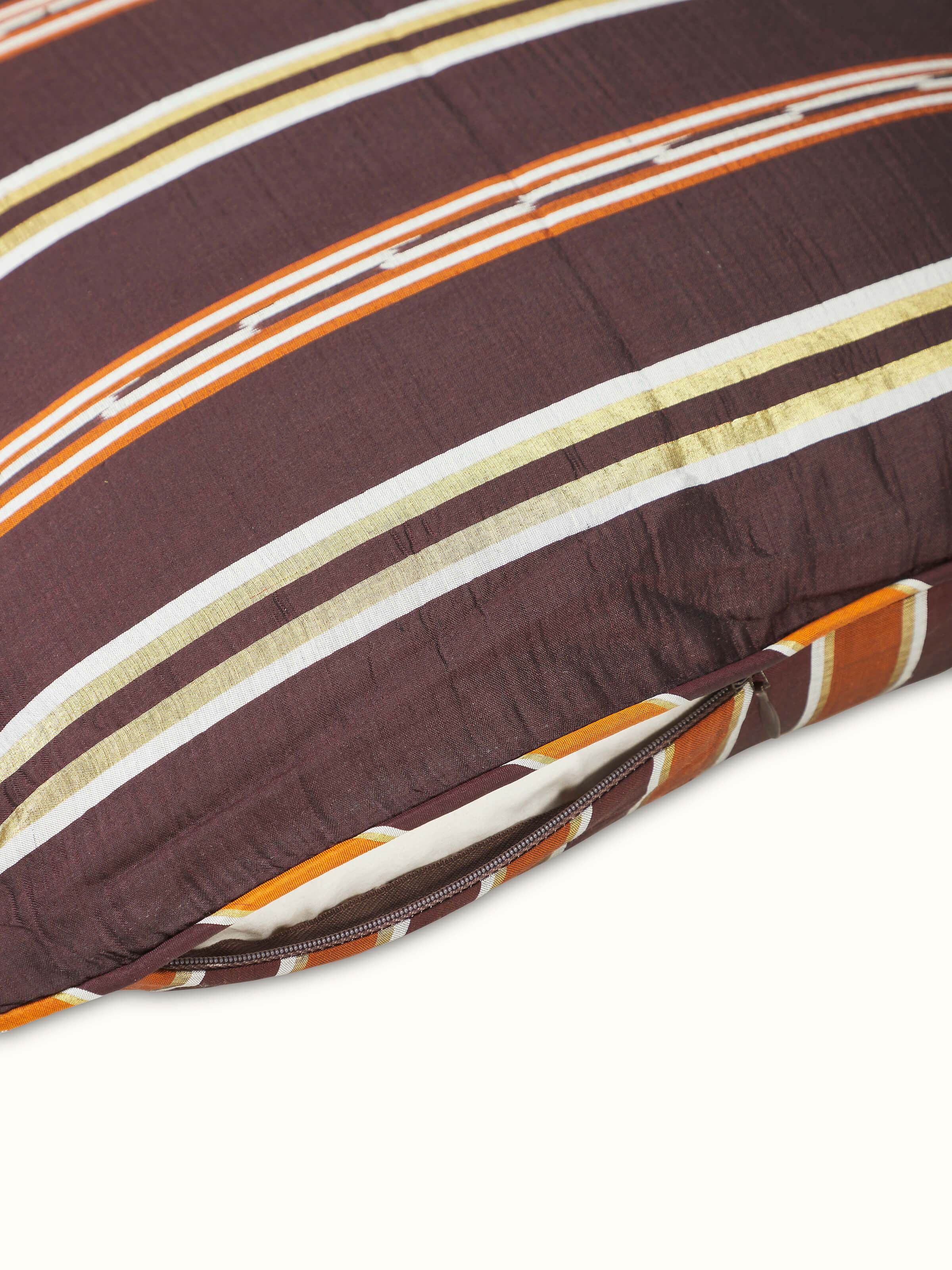 Detailed shot of Sanchaya Coffee Stripe Silk Odisha Handloom Ikat Cushion Cover showcasing the handloom details and color.