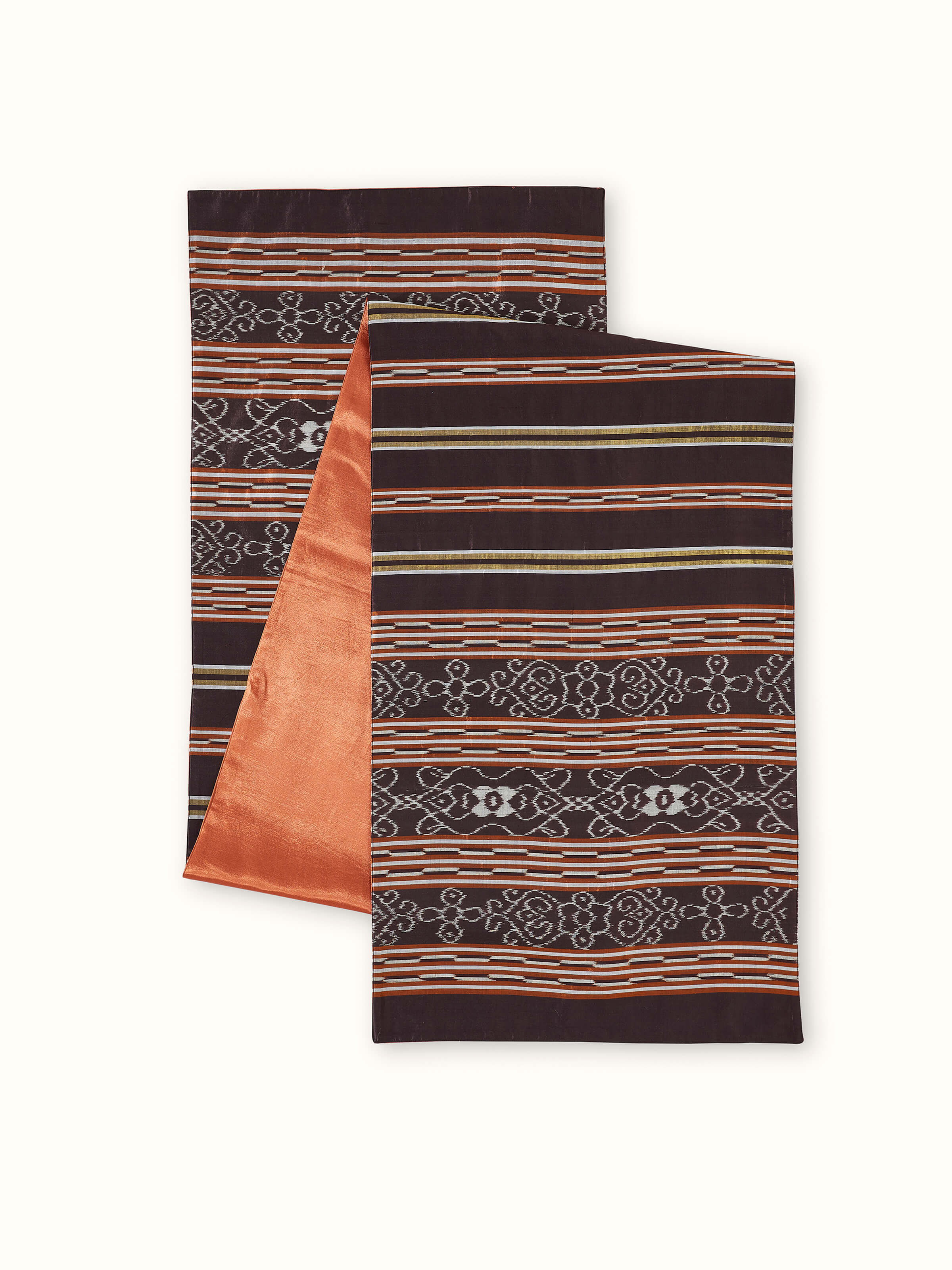 An angled view showing the coffee-striped design of the Sanchaya Odisha Handloom Bed Runner, emphasizing the luxurious sheen and handcrafted finish.