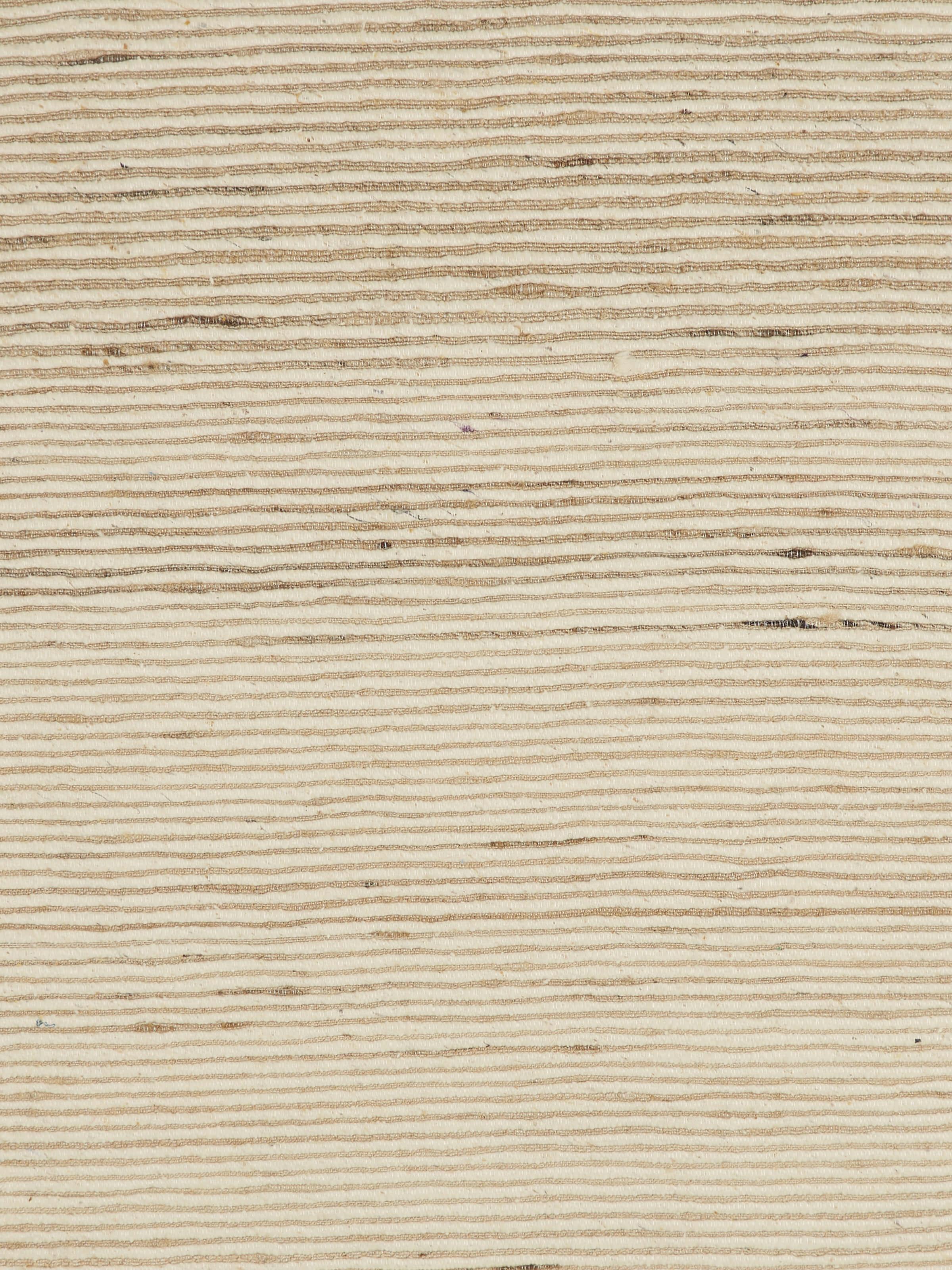 Close-up showing stitch and weave finish of Bhagalpur silk cushion