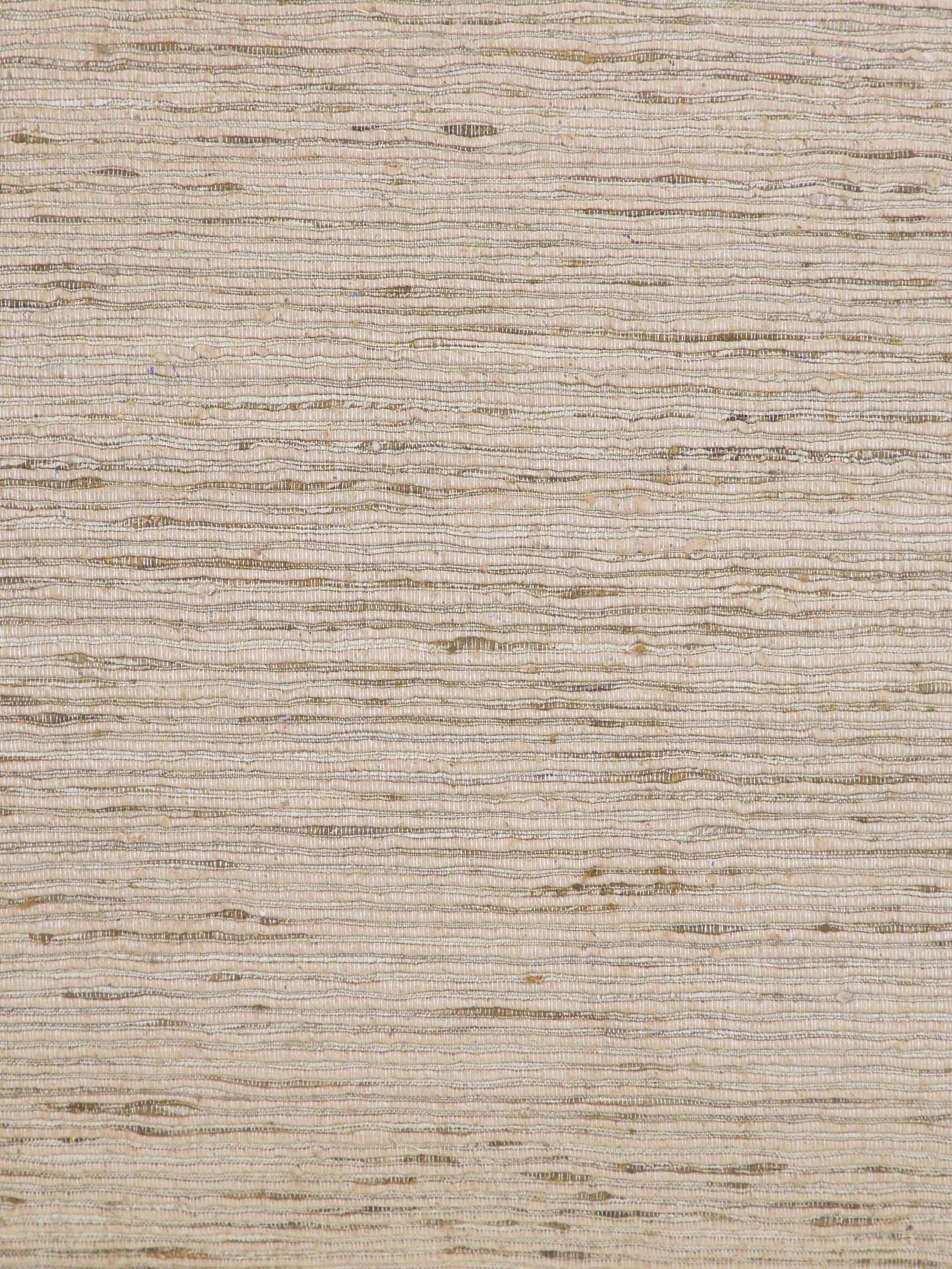 Detail shot of textured grey silk surface emphasizing subtle elegance