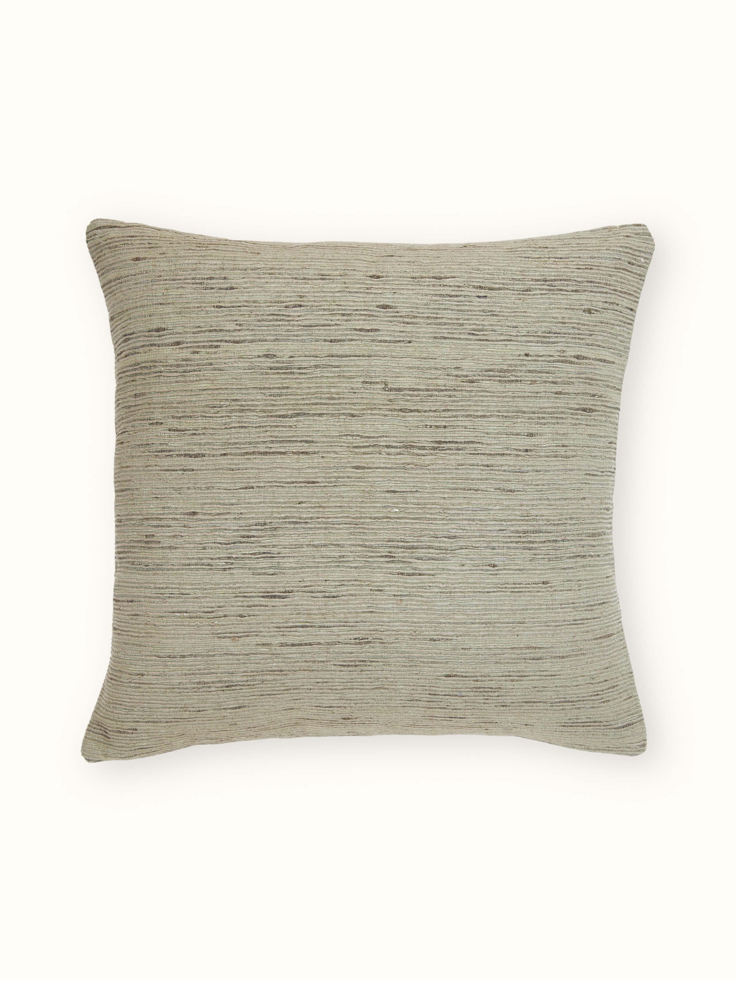 Front view of Ujjwal green silk slub cushion cover with handloom texture and rich sheen