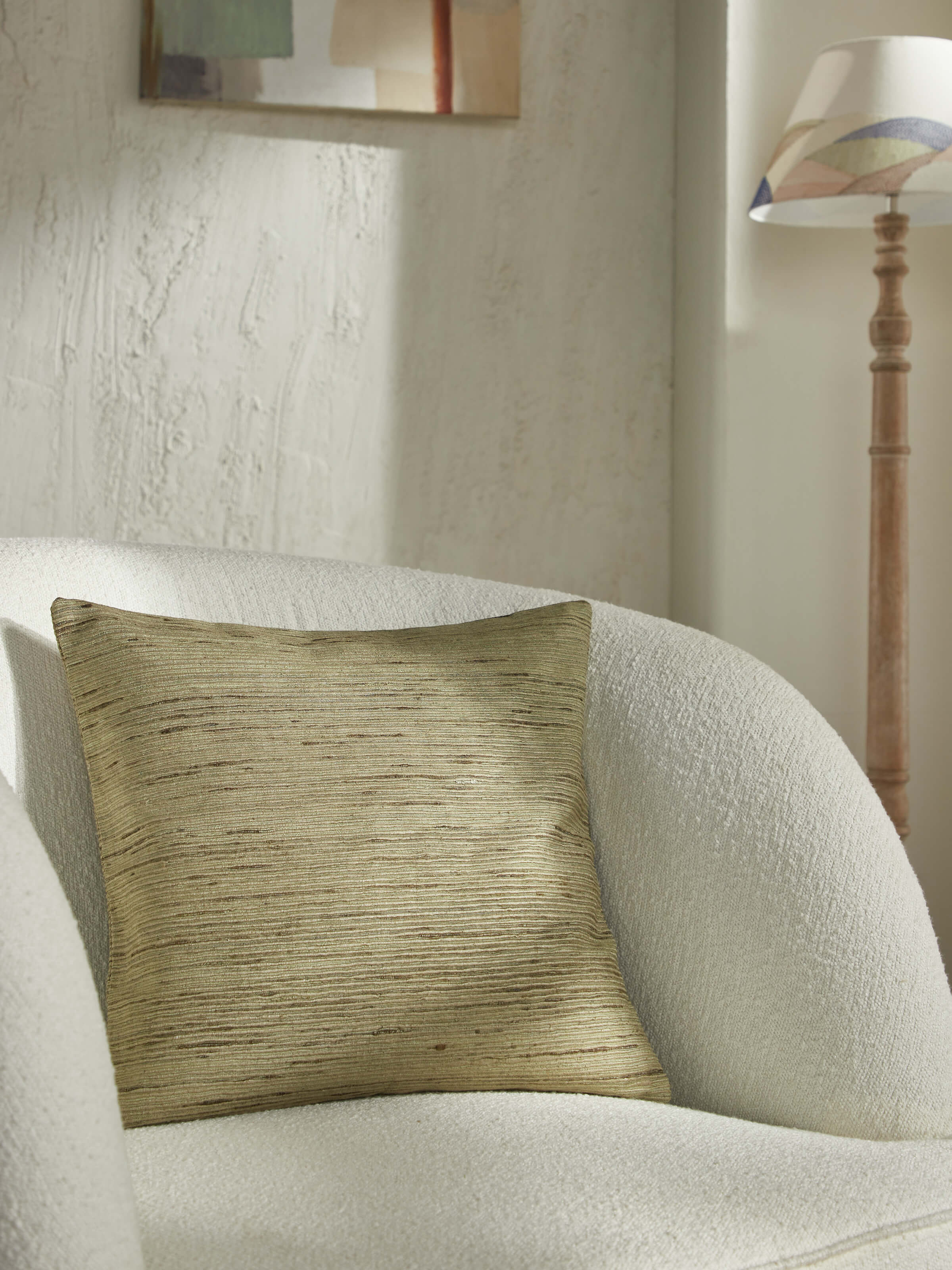 Close-up of Ujjal Light Green Niyama Silk Slub Handloom Cushion Cover showing the handloom details and color.