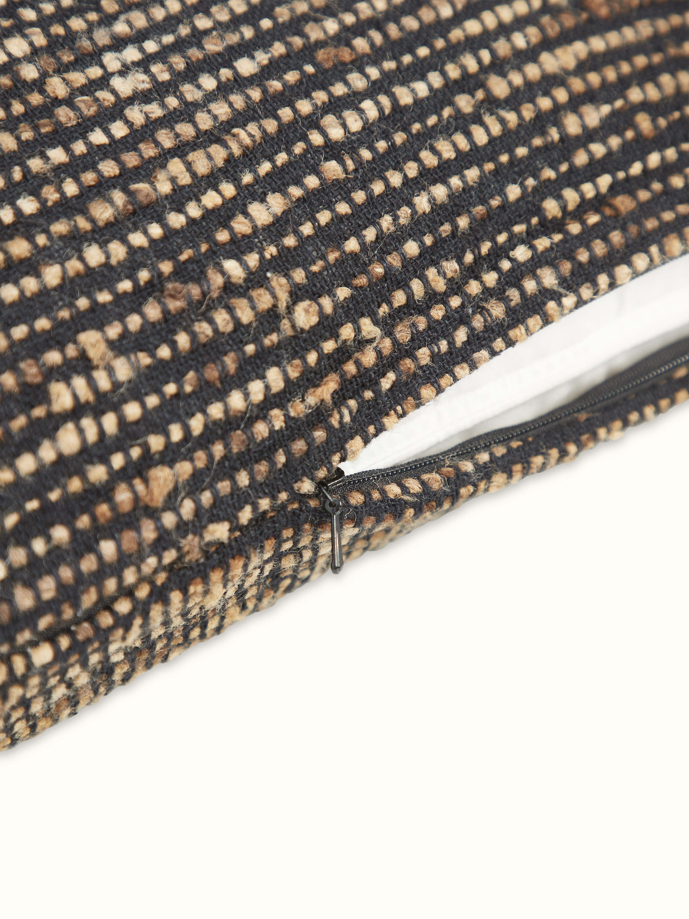 Detailed view of Ujjal Black Kaya silk cushion cover showing the intricate handloom weave and sheen