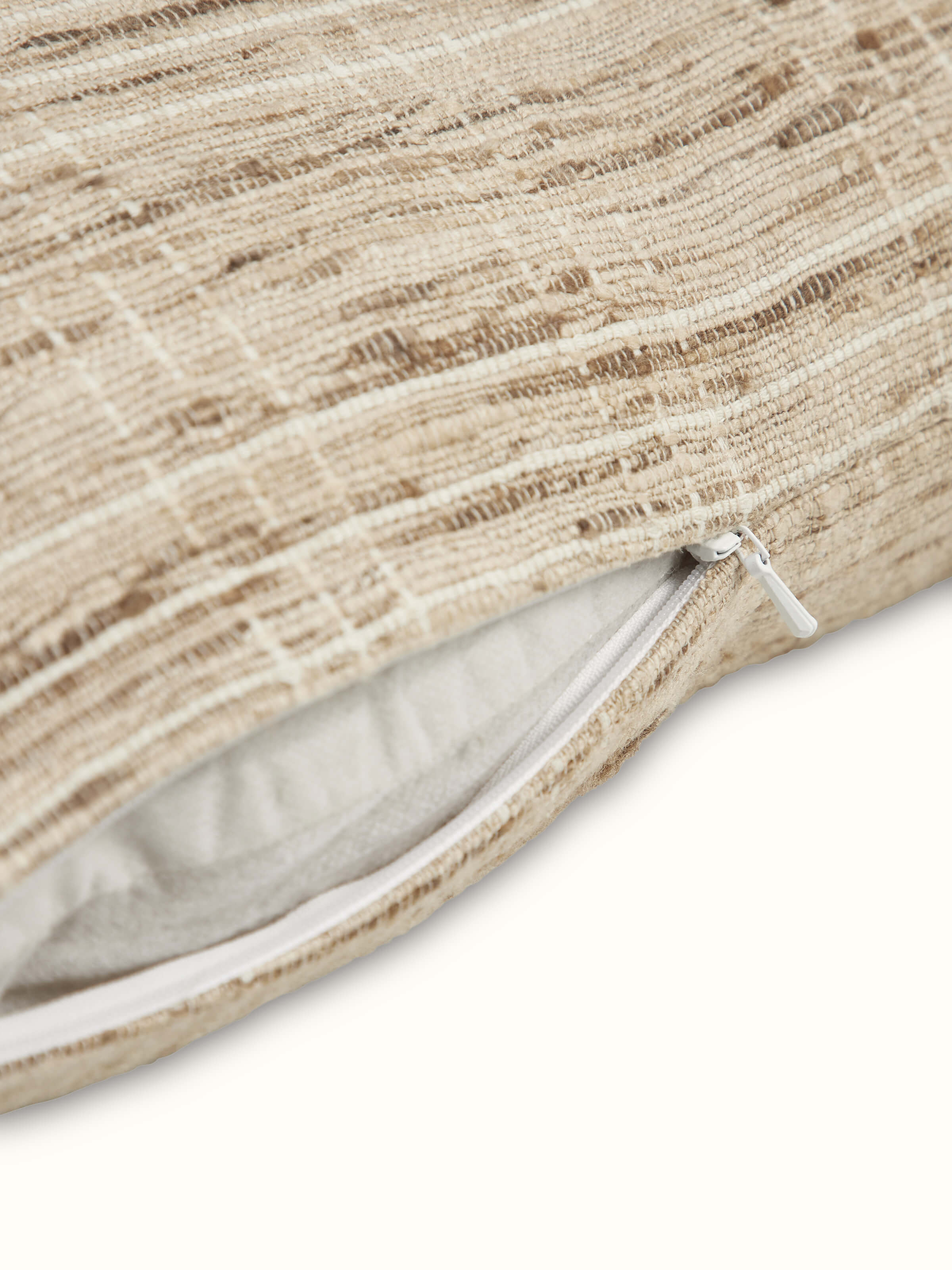 Angled view of handloom cushion cover in Bhagalpur silk with brown check design.