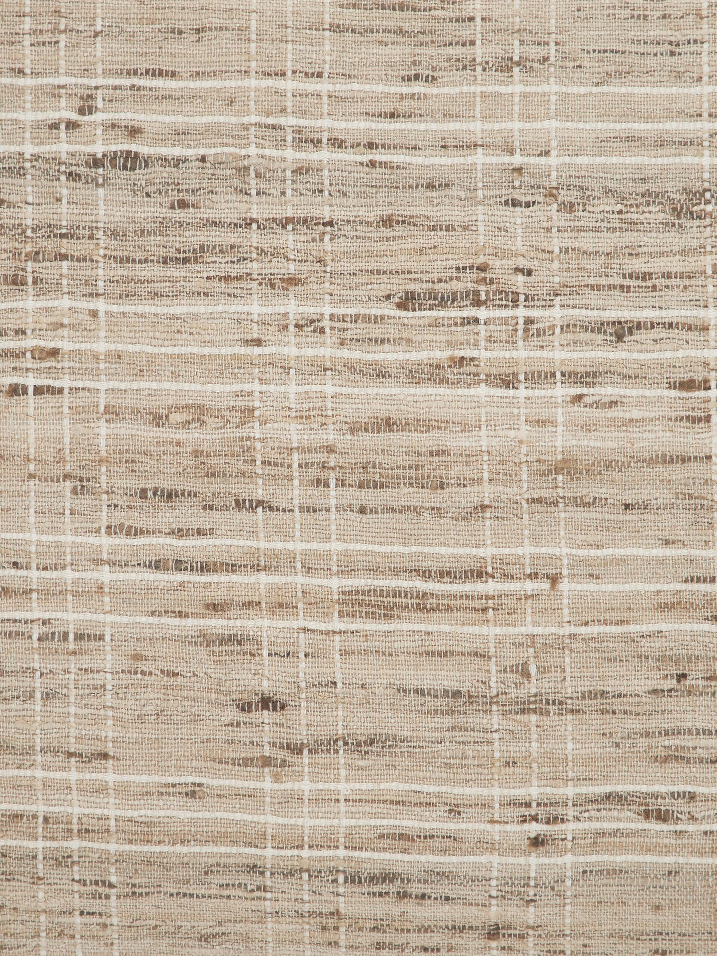 Detail shot of fine handloom weave and rich brown hue of Bhagalpuri silk.