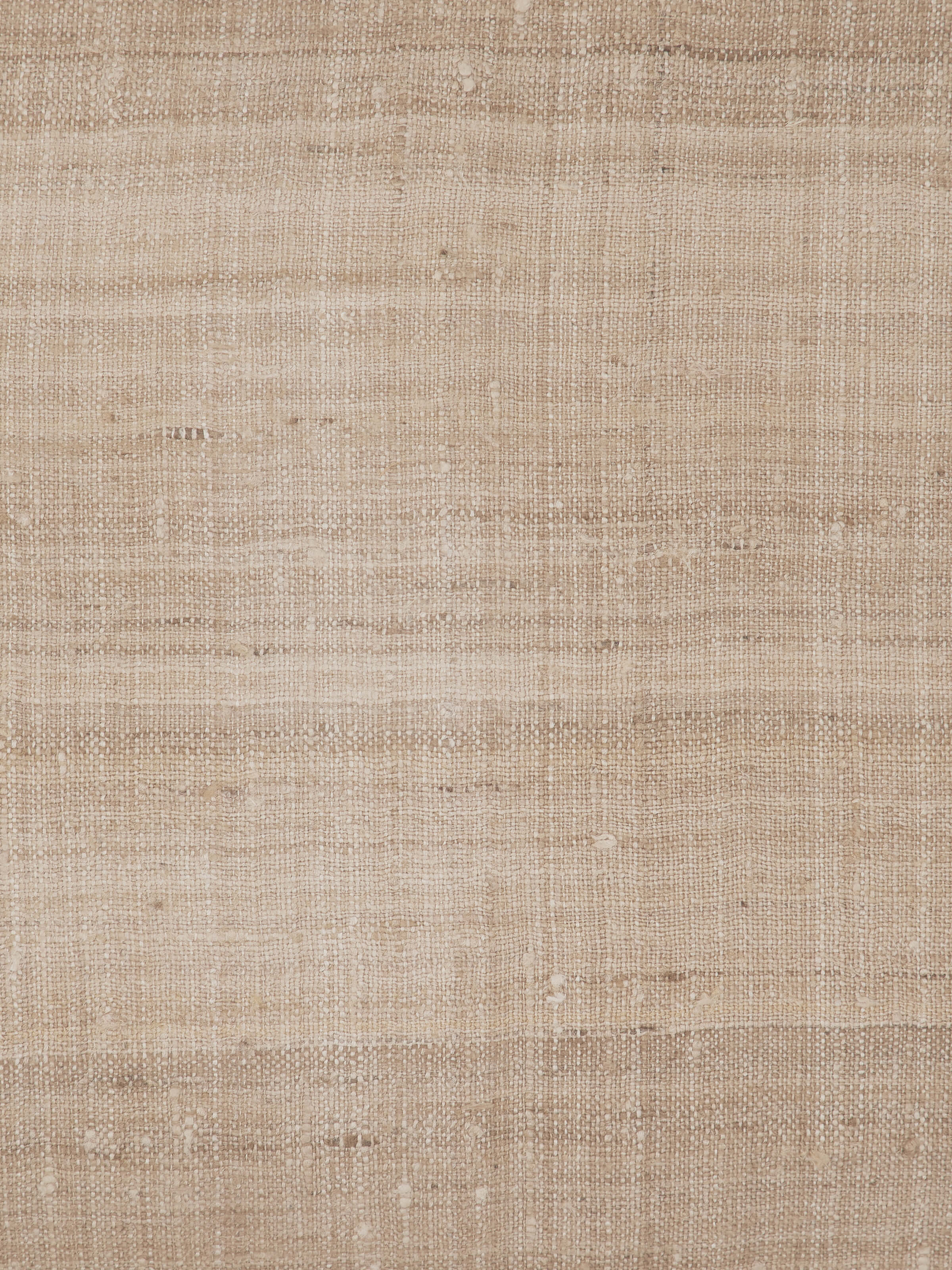 Close-up view of Ujjal light brown dharana silk slub handloom cushion cover showcasing the texture and stitching details