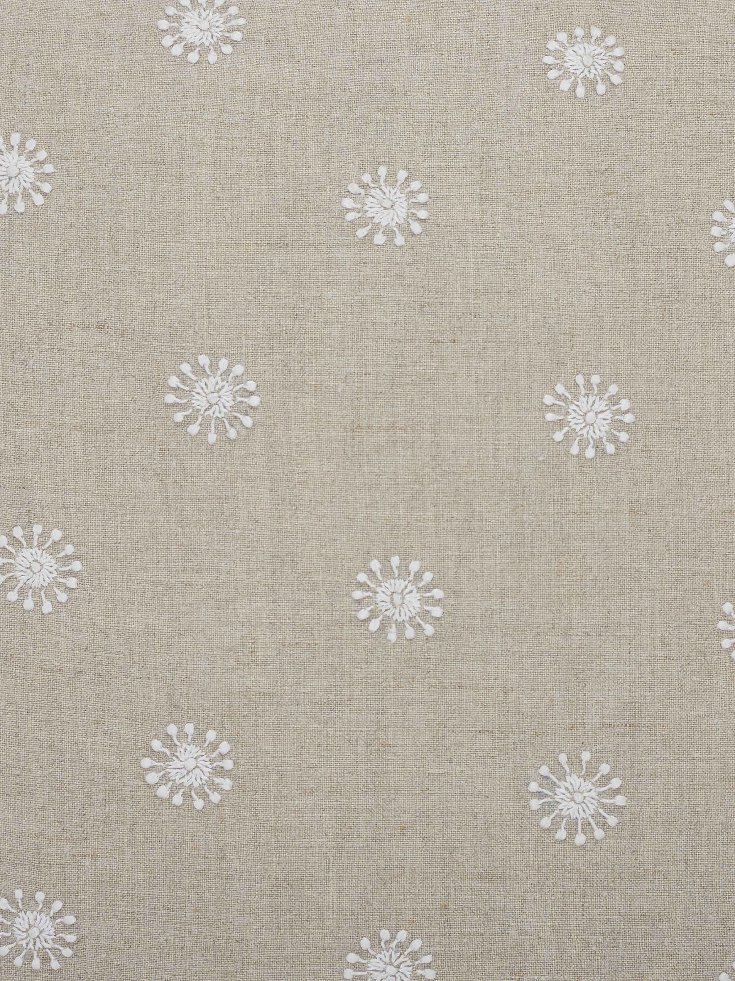 Detail shot of embroidery and texture on beige cotton cushion – Rann hand-embroidered piece