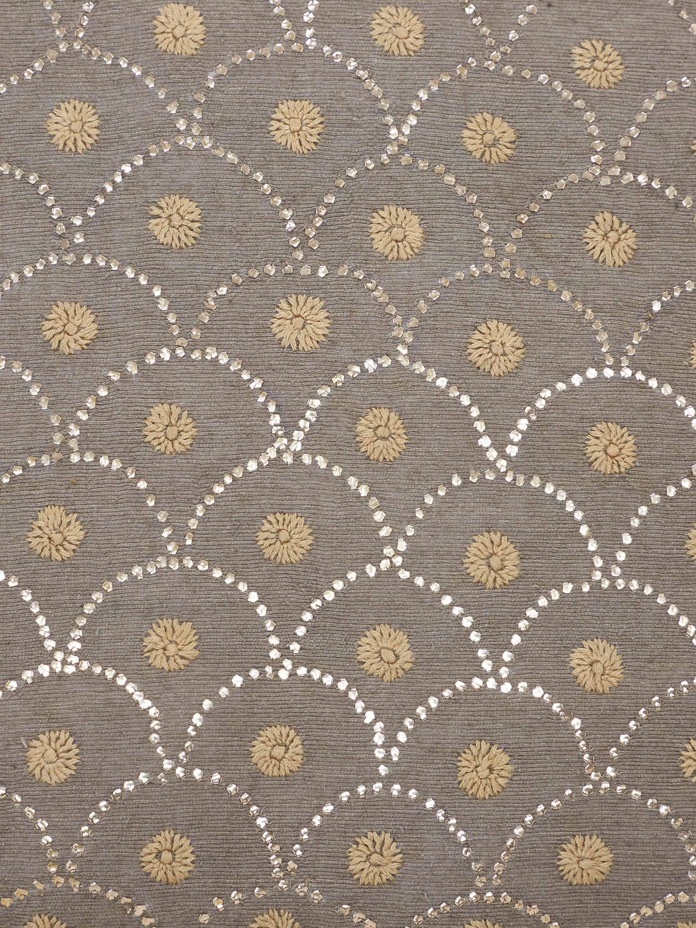 Close-up detail capturing hand embroidery and texture on Pragya silk cushion cover