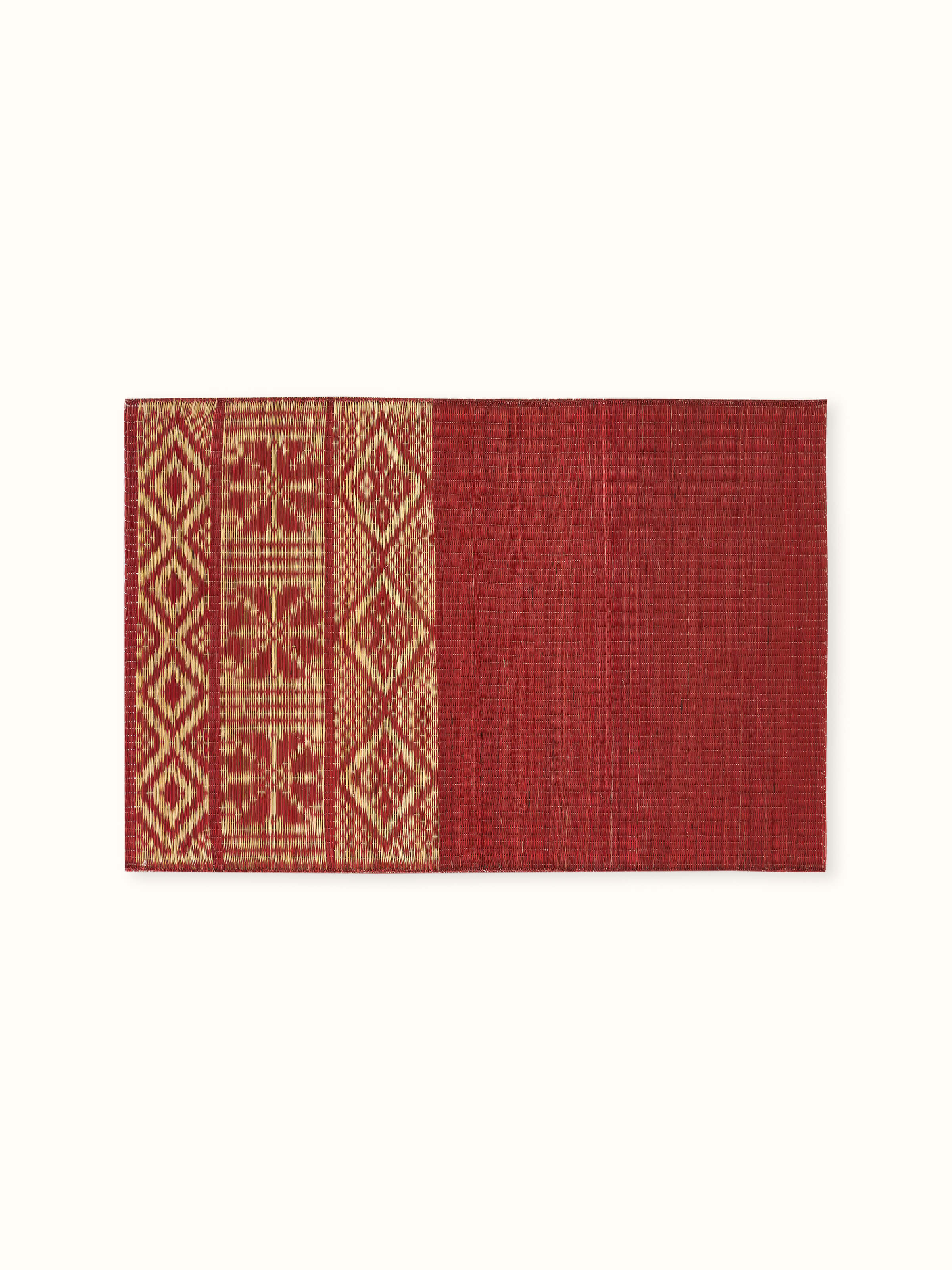 Front view of Prakriti red Madurkathi table mats featuring folk geometric patterns – set of 6