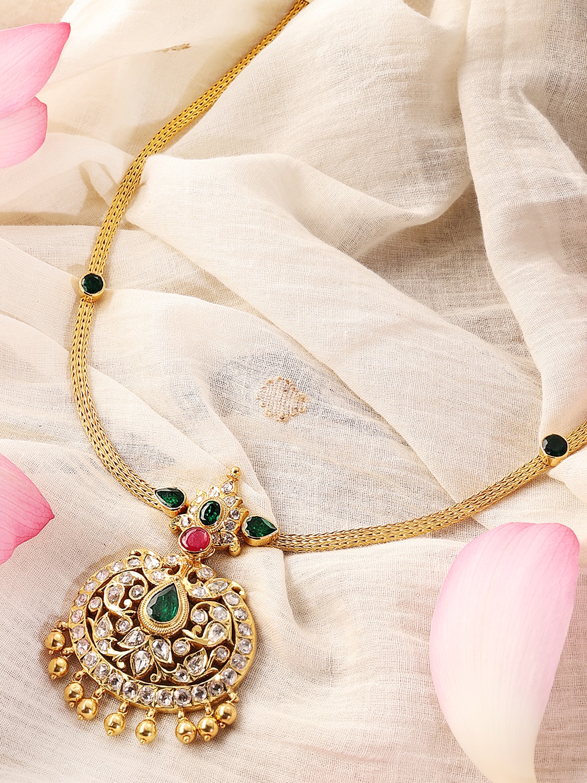 Close-up side angle highlighting the detailed craftsmanship of the gold collar necklace