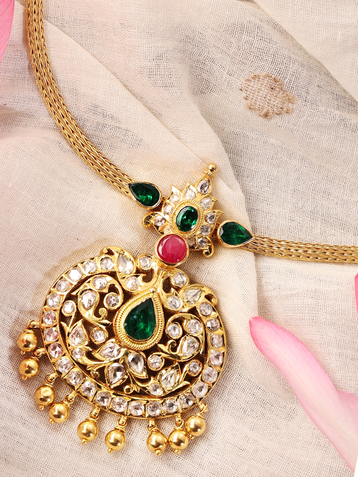 Detailed image focusing on the delicate patterns and artistry of the gold collar necklace