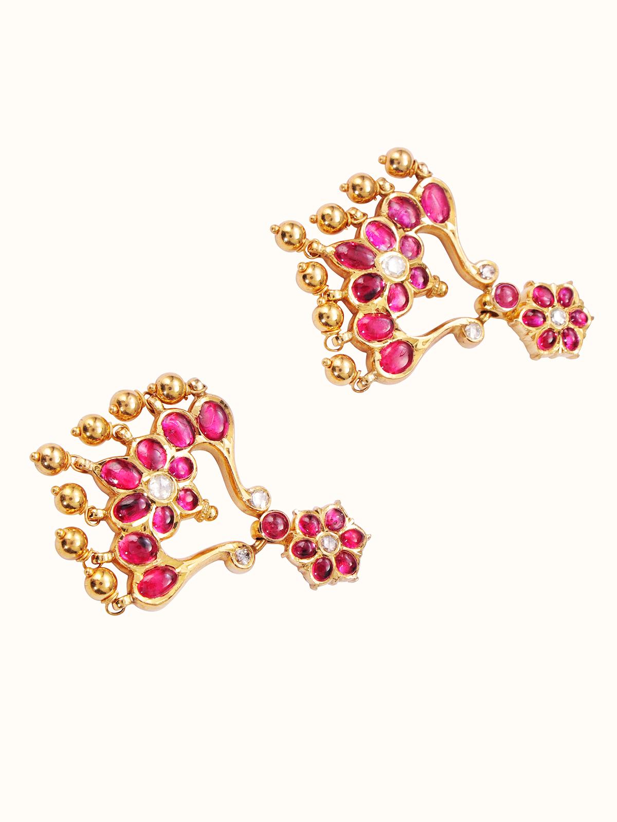 Side view of Kundala Velai 22 Karat Gold Jhumkas showcasing the elegant drop design and intricate details.