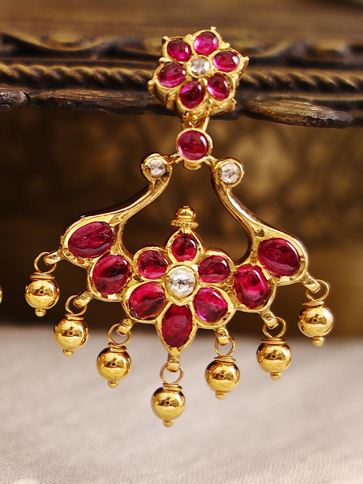 Detailed view of Kundala Velai 22 Karat Gold Jhumkas showcasing the intricate design and luxurious gold finish.