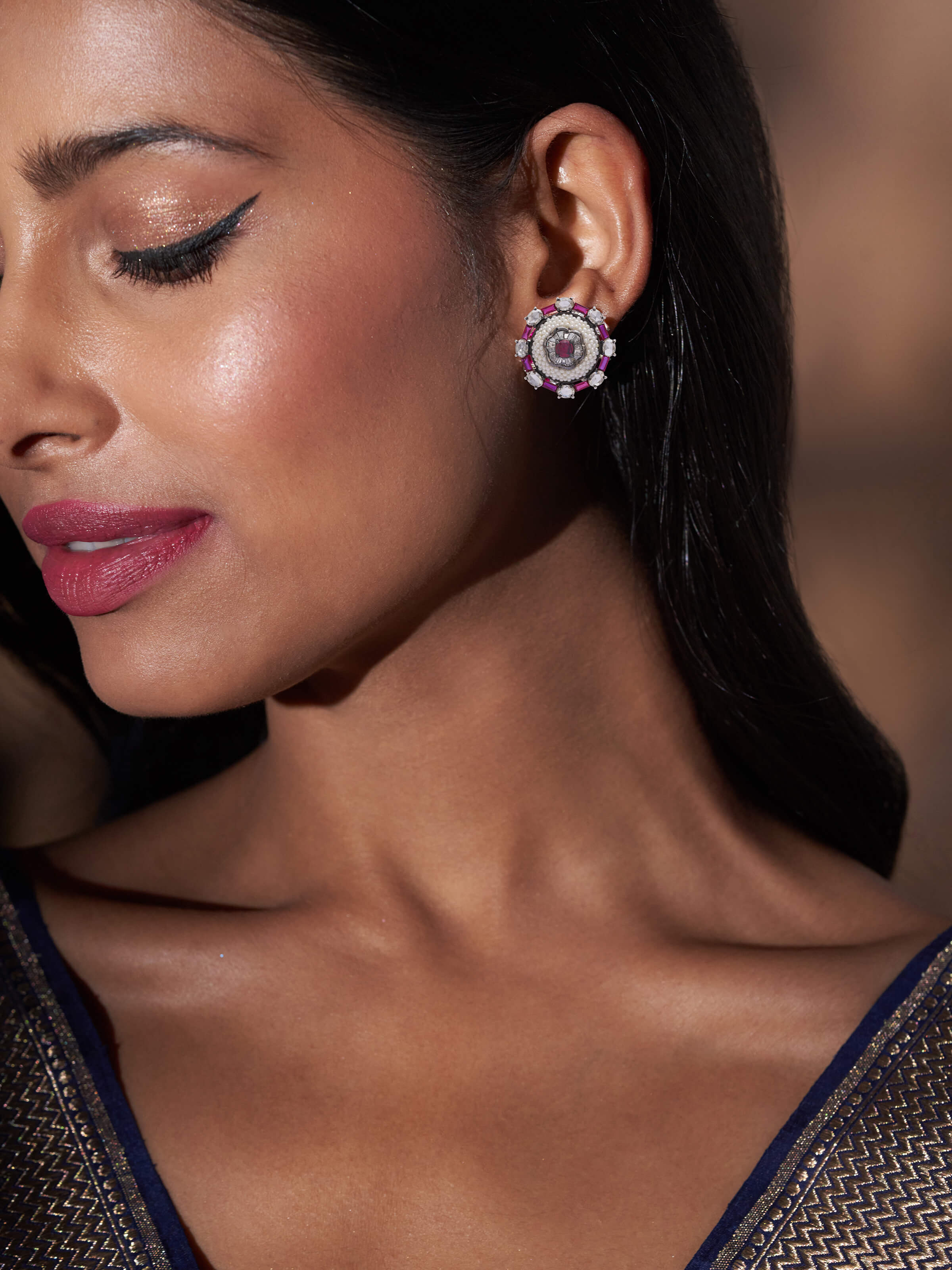 Side view of Pearl Pirohi 18 Karat Gold Studs by Swadesh showing the elegant pearl design and fine gold setting