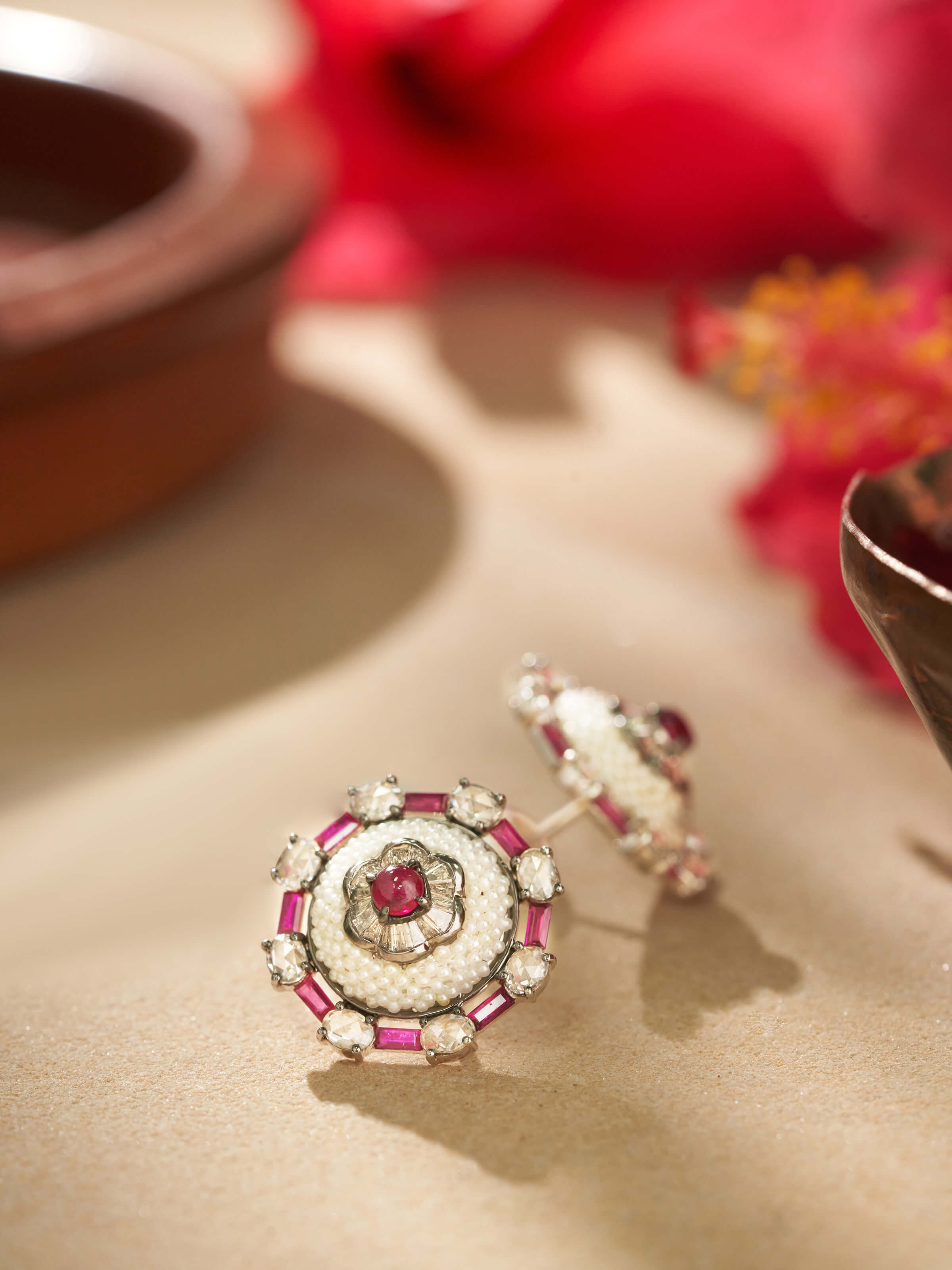 Close-up of Pearl Pirohi 18 Karat Gold Studs by Swadesh highlighting the shine of the pearls and the smooth gold finish