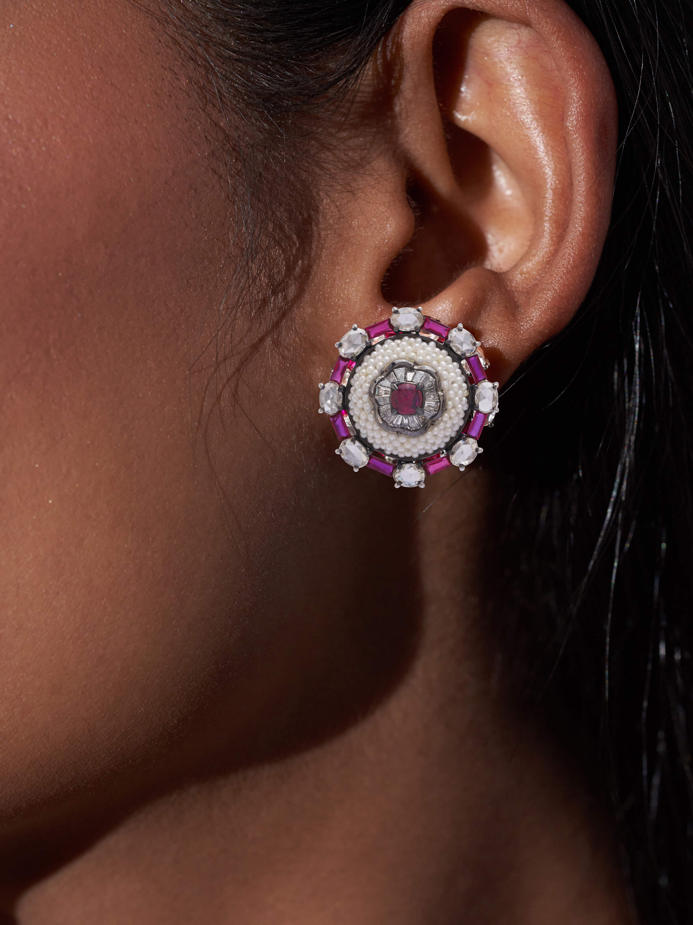 Overhead view of Pearl Pirohi 18 Karat Gold Studs by Swadesh showcasing the gleam of the pearls and gold details
