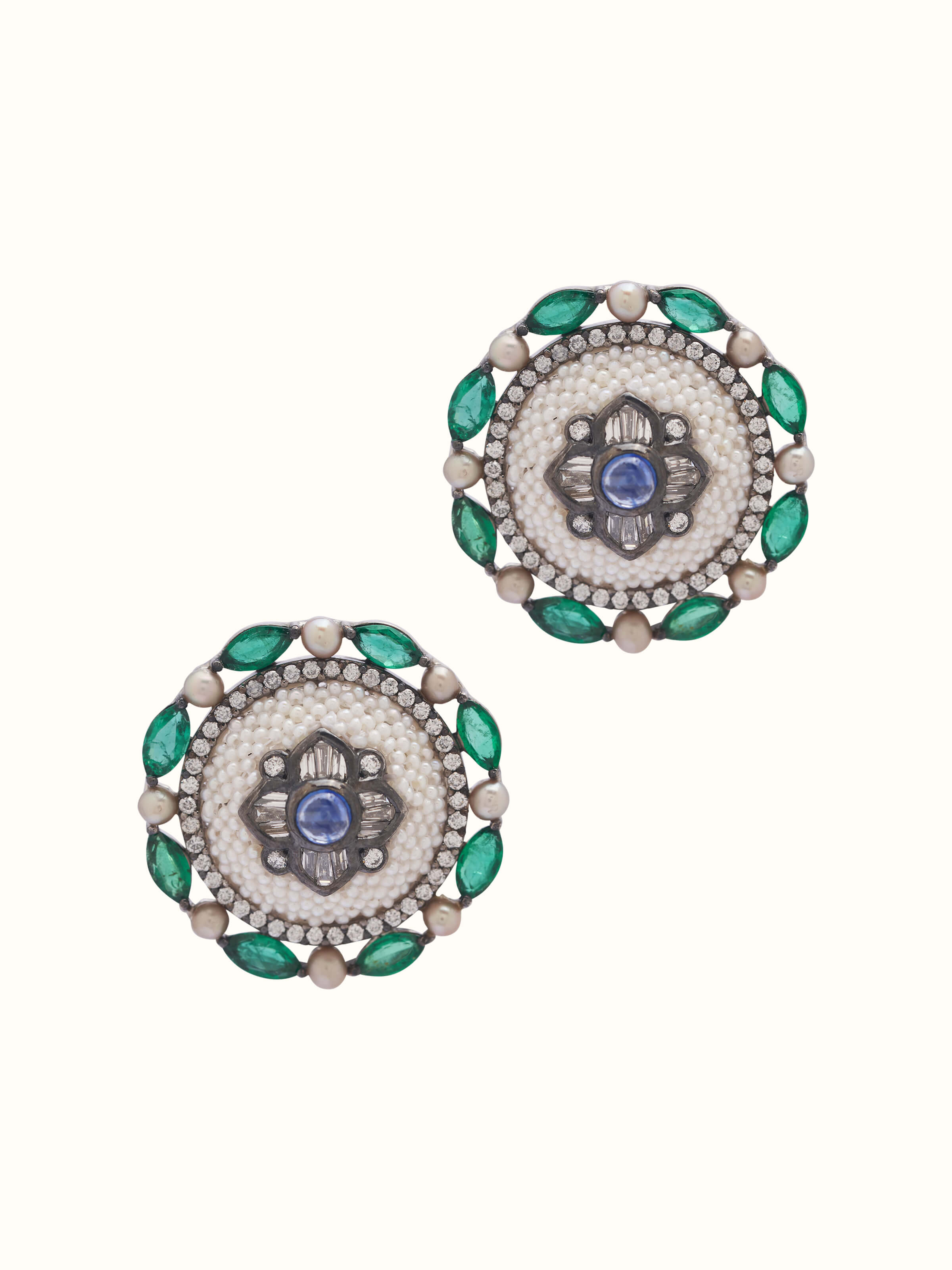 Front view of Pearl Pirohi 18 karat gold studs featuring elegant pearl center with gold floral setting.