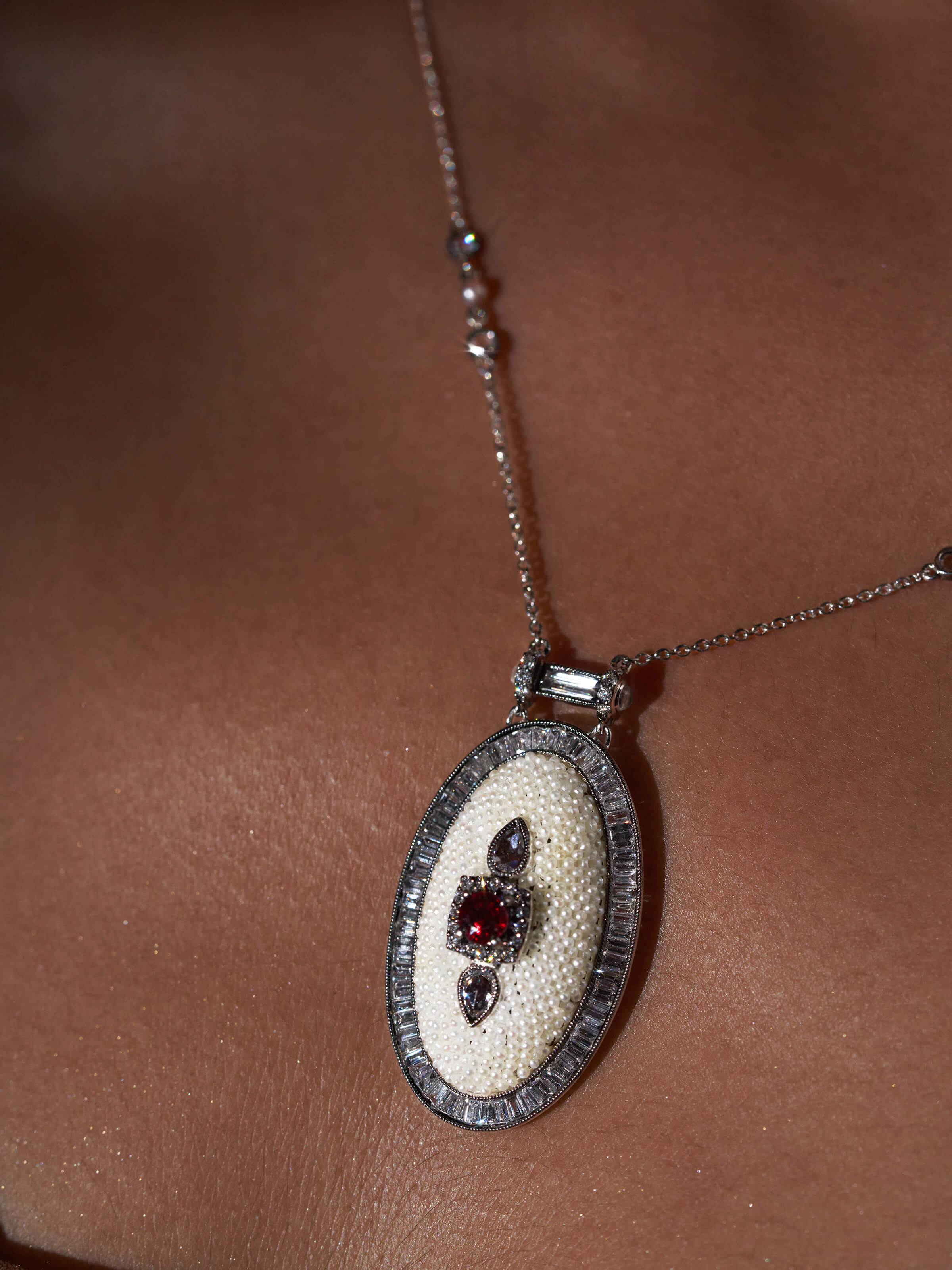 Pendant displayed with chain showing overall length and style