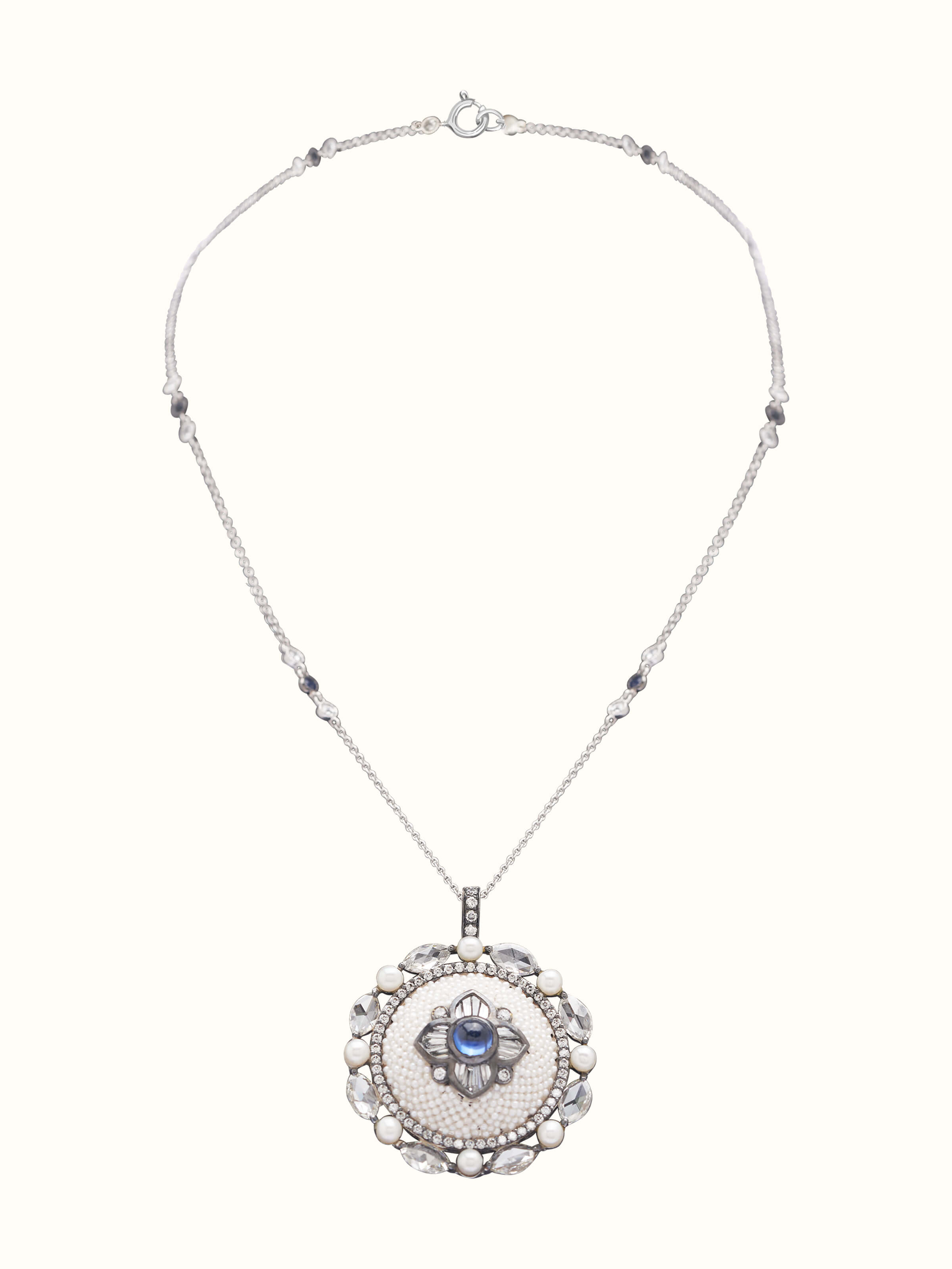 Front view showcasing the pendant and chain with elegant pearl detail