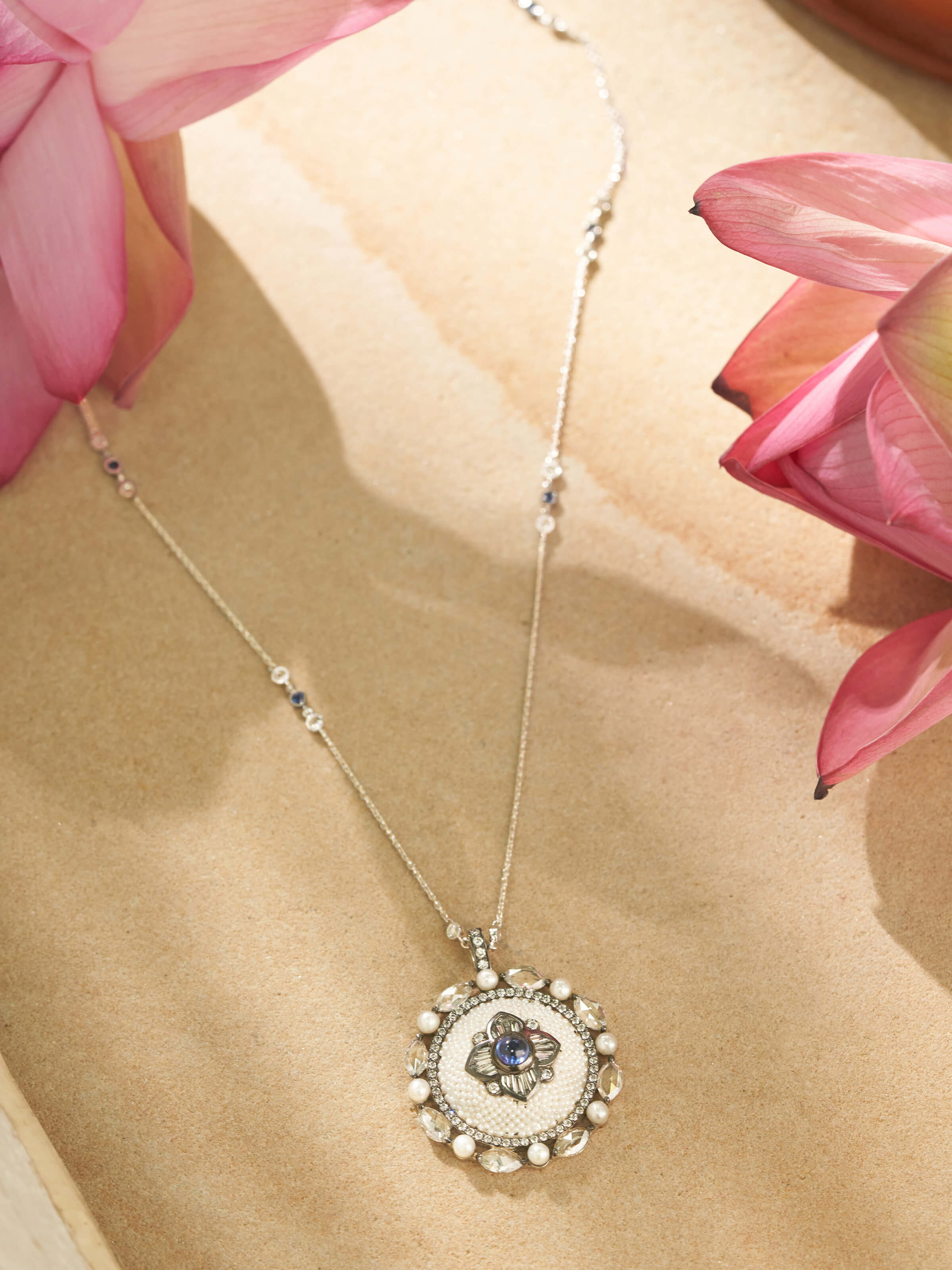 Angled shot revealing the pendant’s design and chain texture