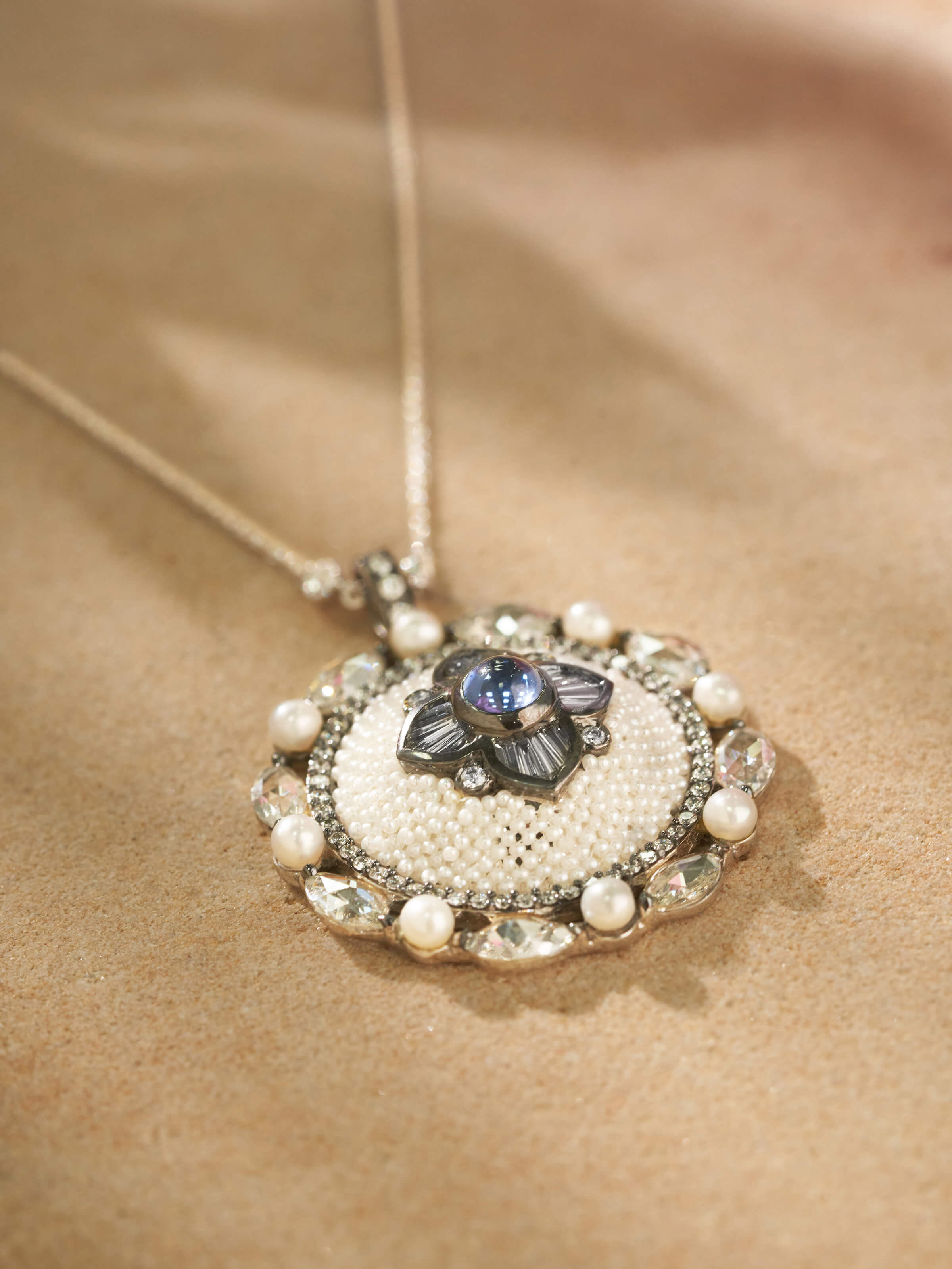 Side view emphasizing the pendant’s depth and craftsmanship