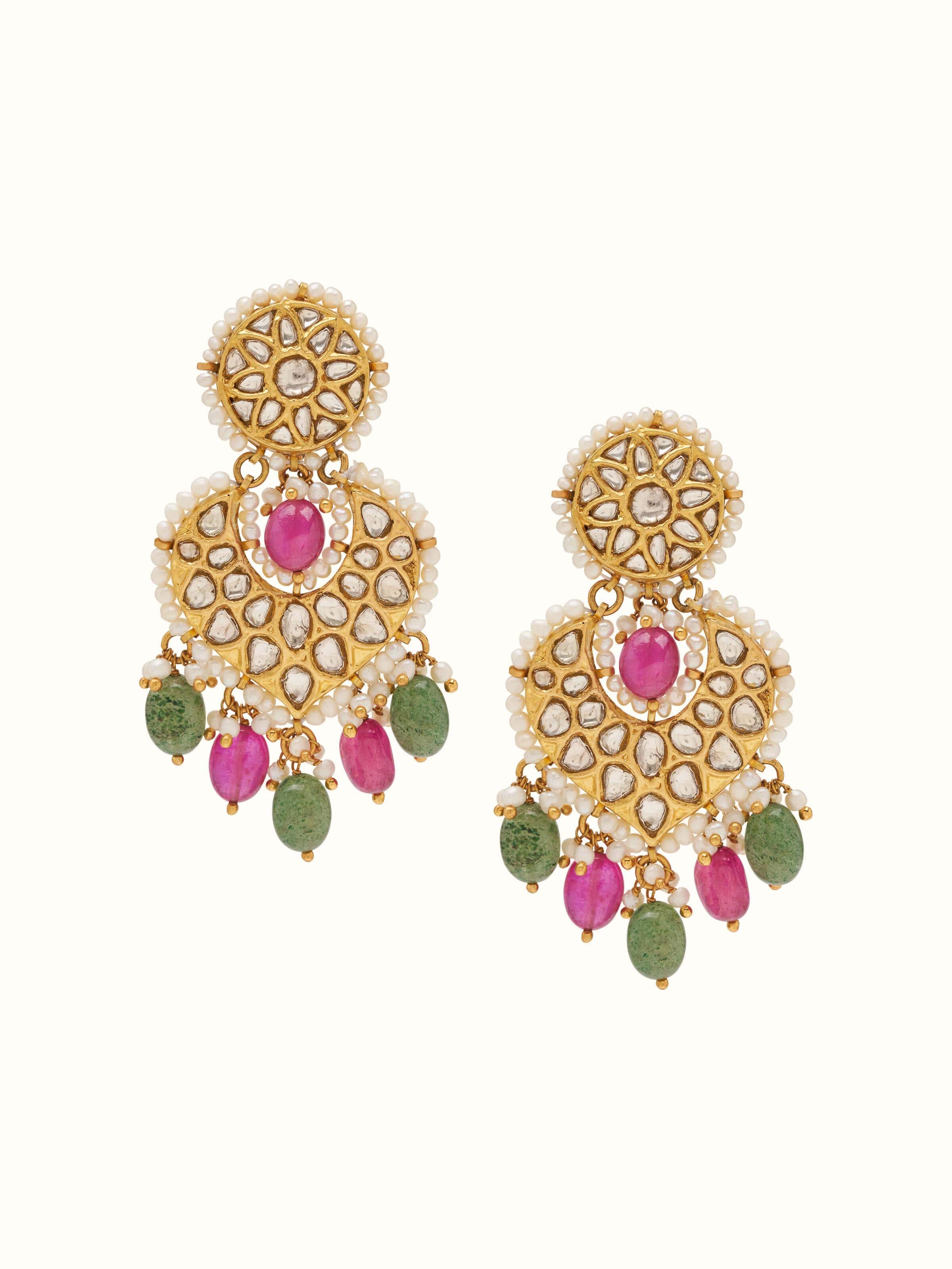 Front view presenting the classic gold drop earrings with fine detailing