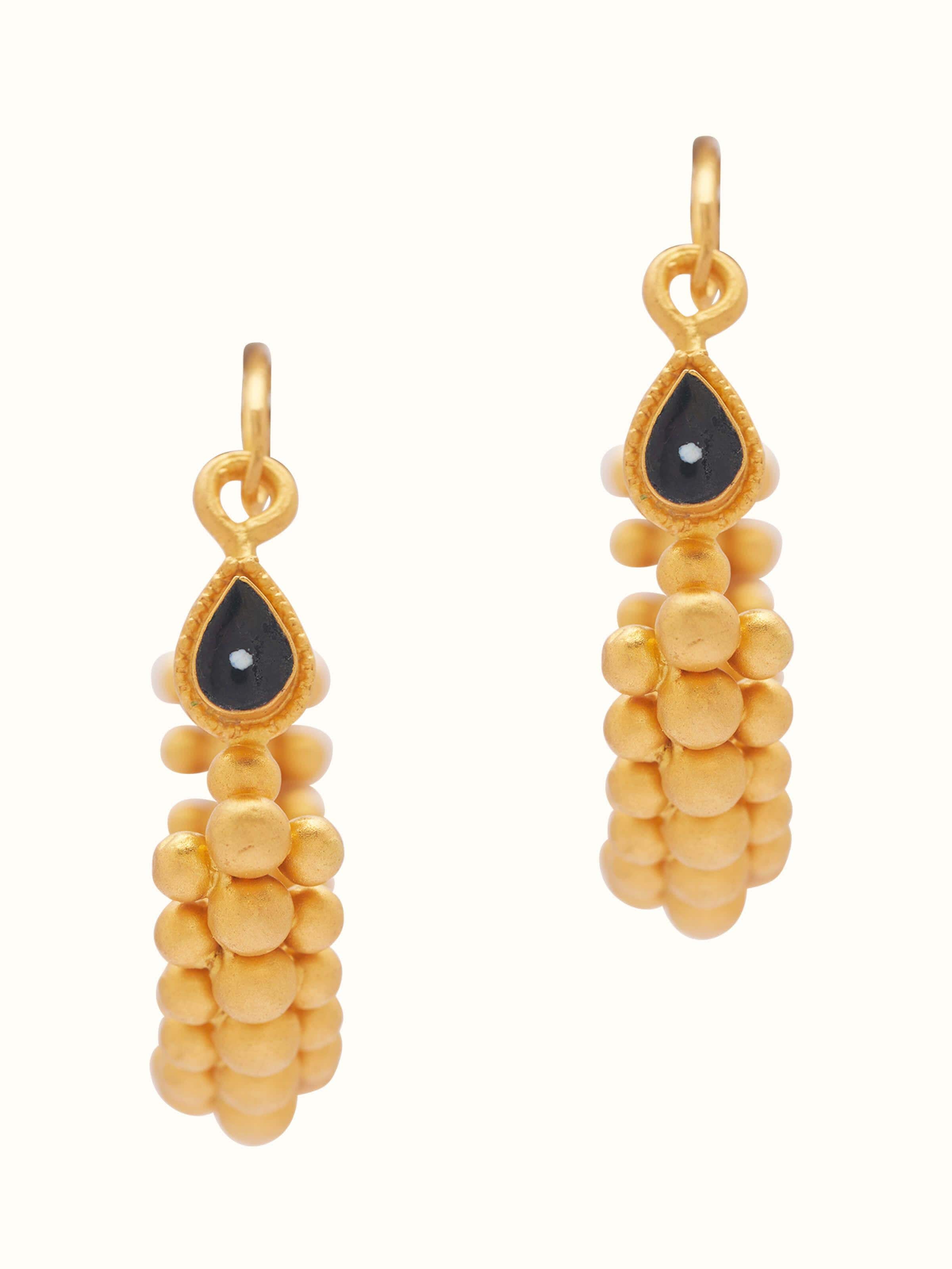 Front view of 22 karat gold hoop earrings with traditional Thushi design and intricate detailing