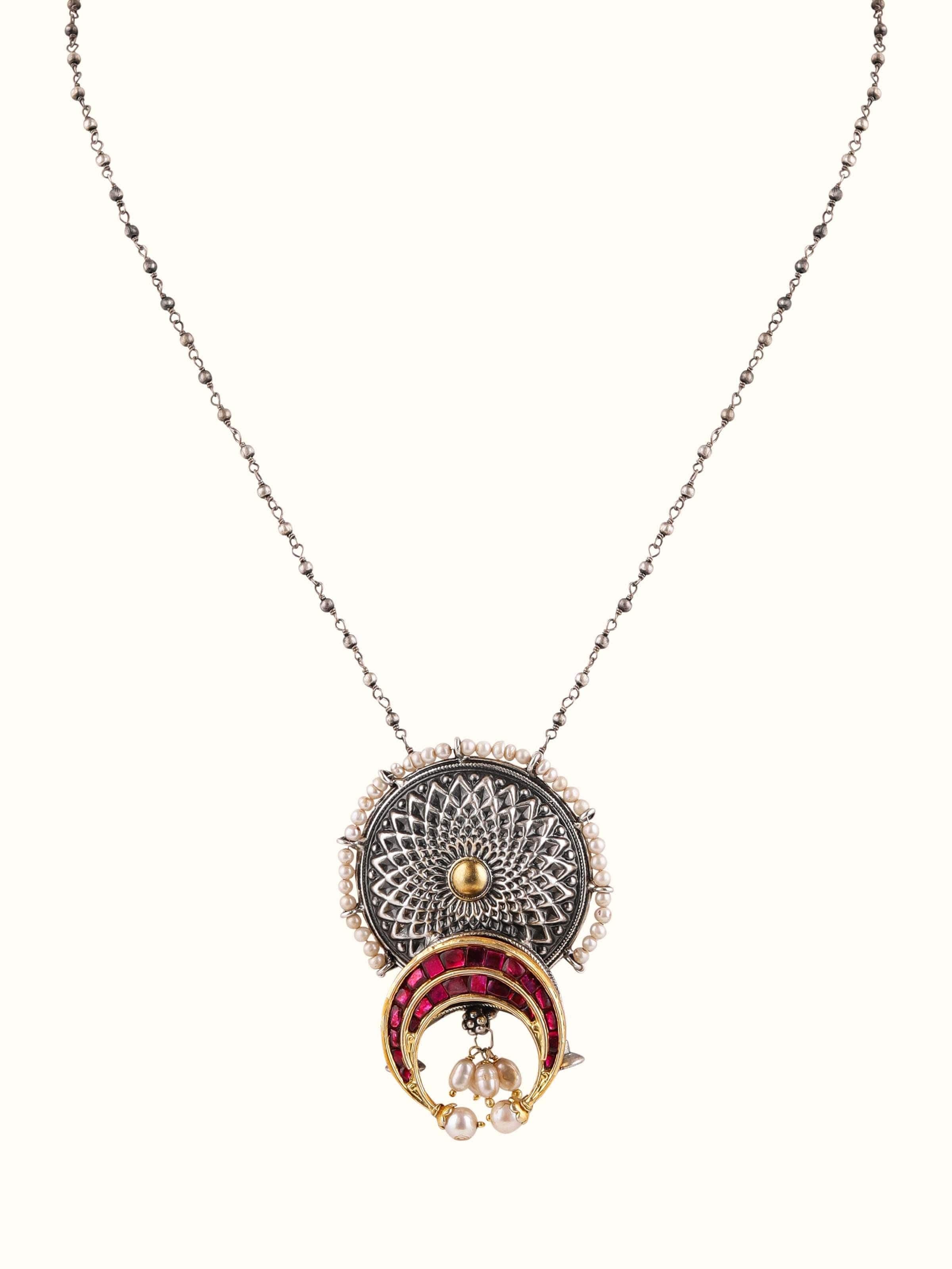 Front view of silver smithing pendant & chain featuring an elegant and detailed design