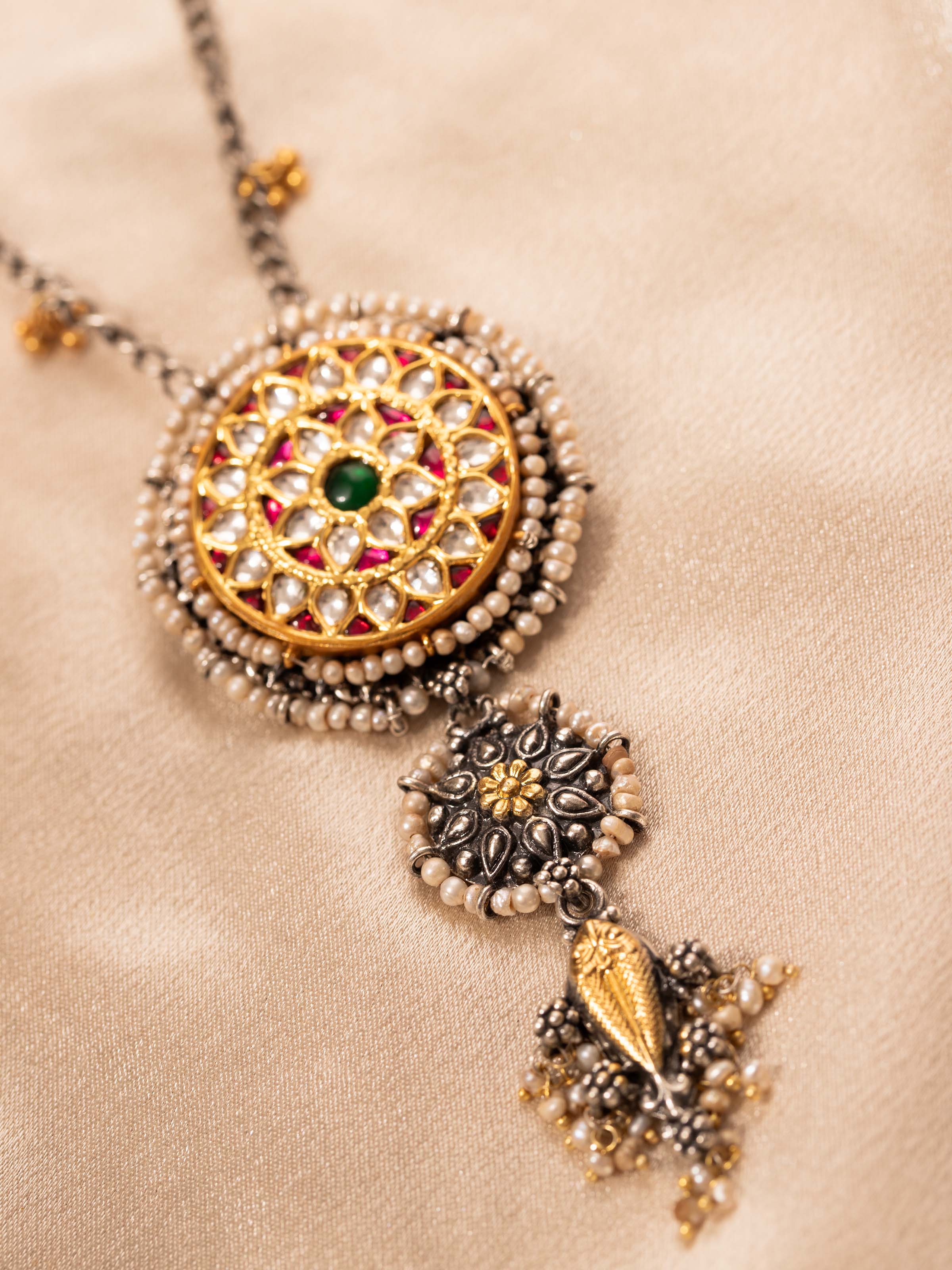 Detailed view of Silver Smithing Pendant & Chain from a distance showcasing its full design and silver quality.