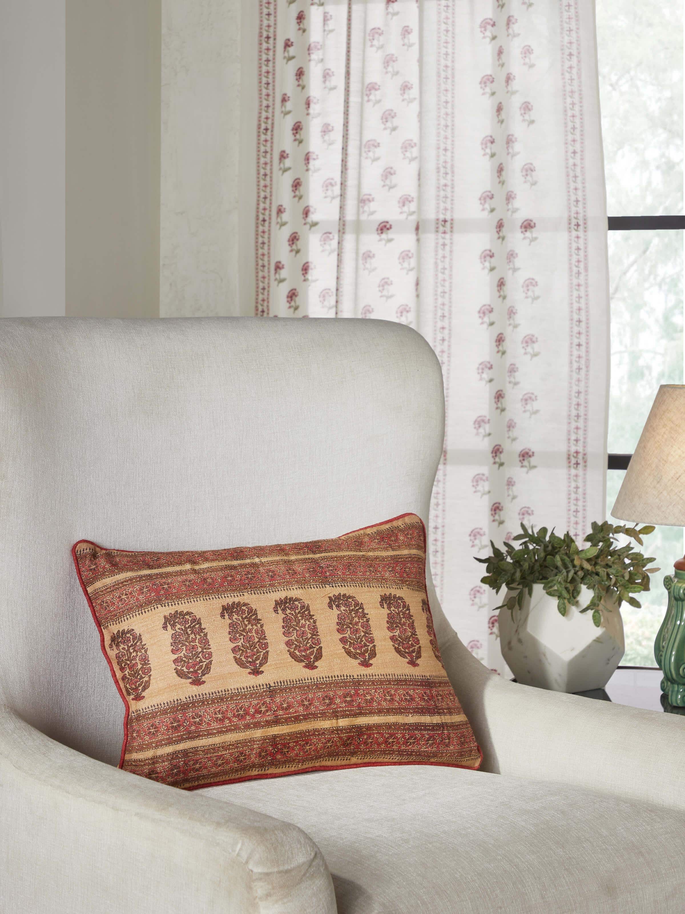 Close-up of Vasudha rust stripe tussar silk Bagru hand block print cushion cover, focusing on the block print details.