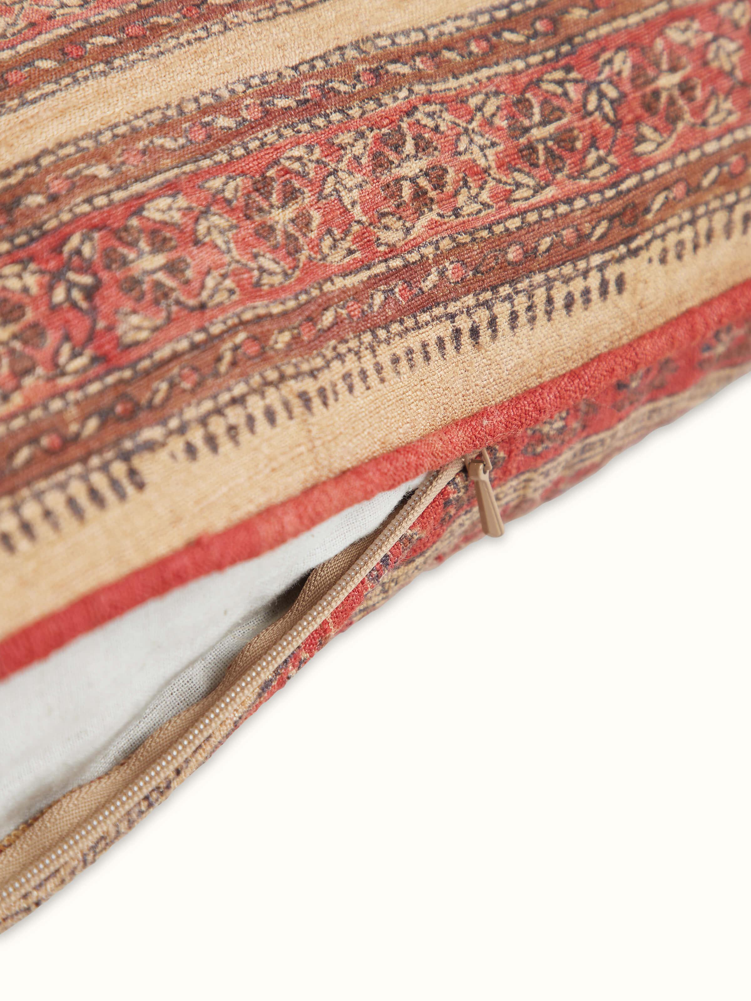 Detailed view of Vasudha rust stripe tussar silk Bagru hand block print cushion cover highlighting the silk texture and print.