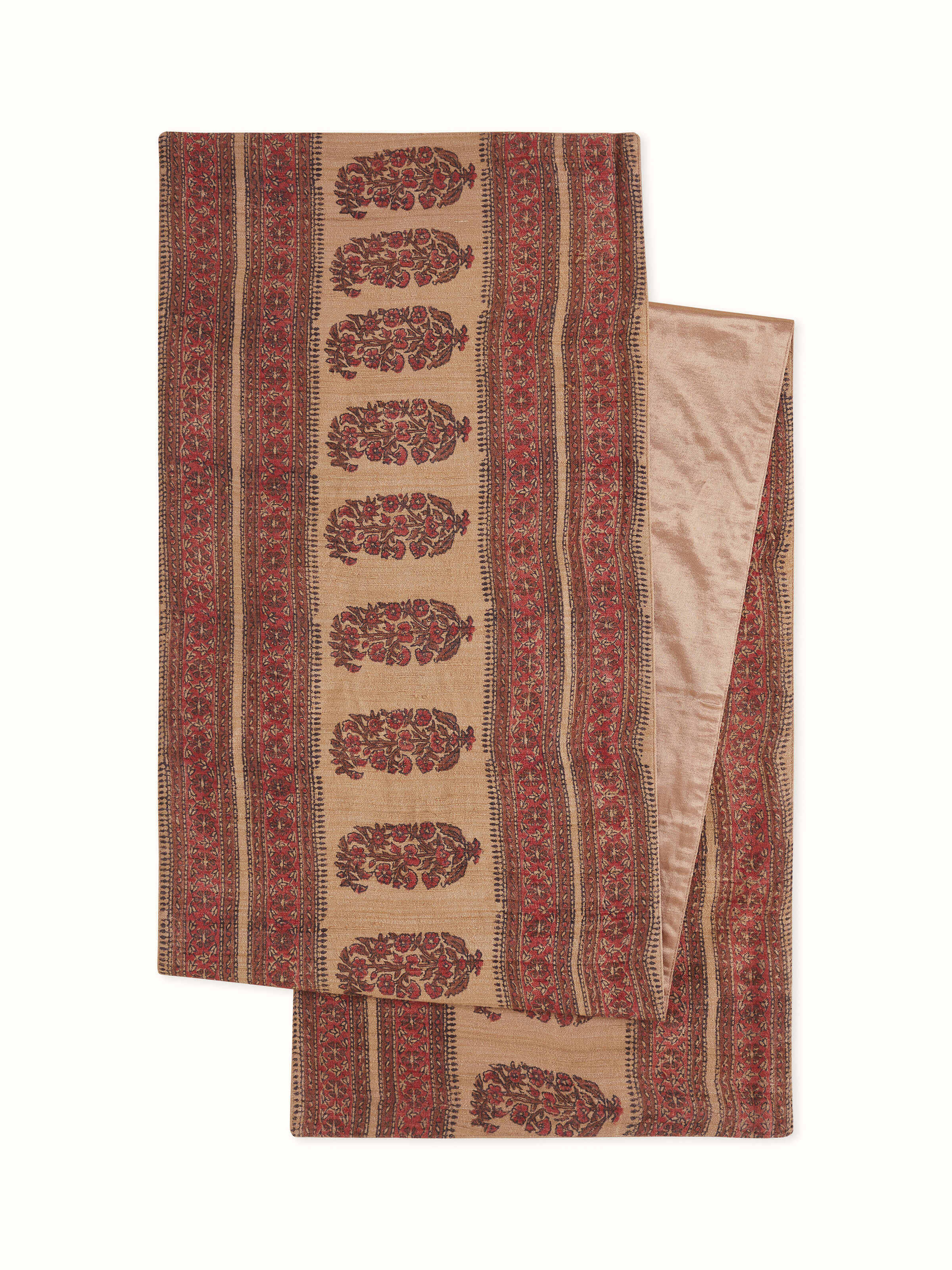 Front view of Vasudha rust paisley tussar silk table runner with traditional Bagru hand block print