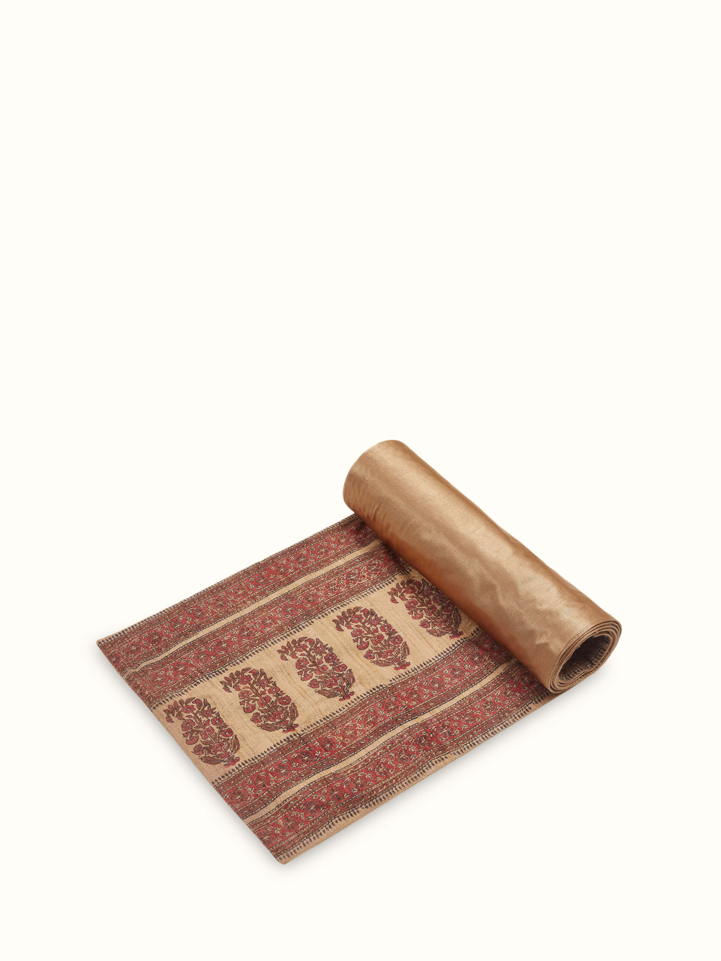Angled view displaying hand block printed paisley pattern on rich tussar silk – Vasudha runner