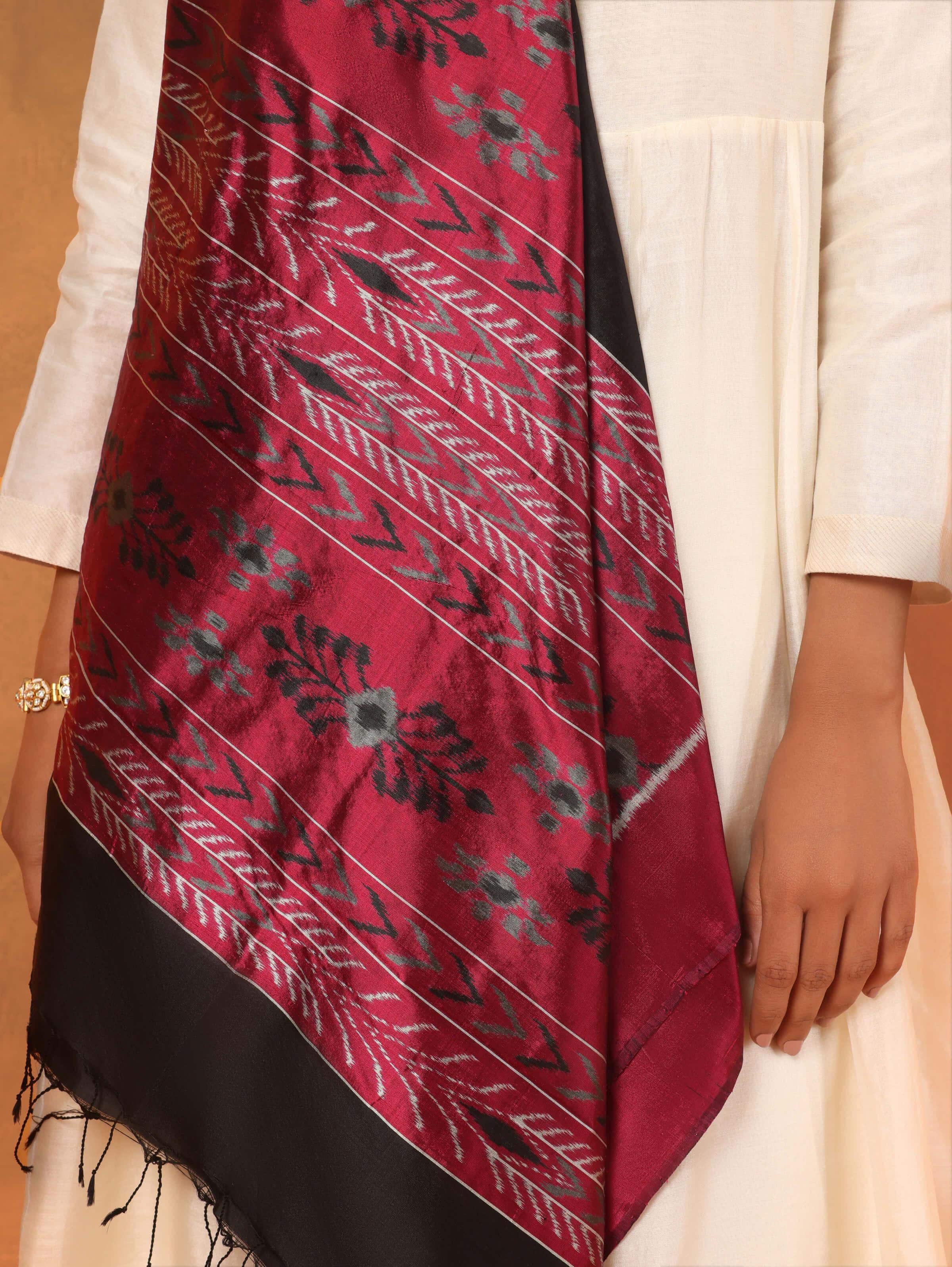 Pink and black silk Odisha Ikat dupatta close-up showing silk texture and intricate Ikat motifs