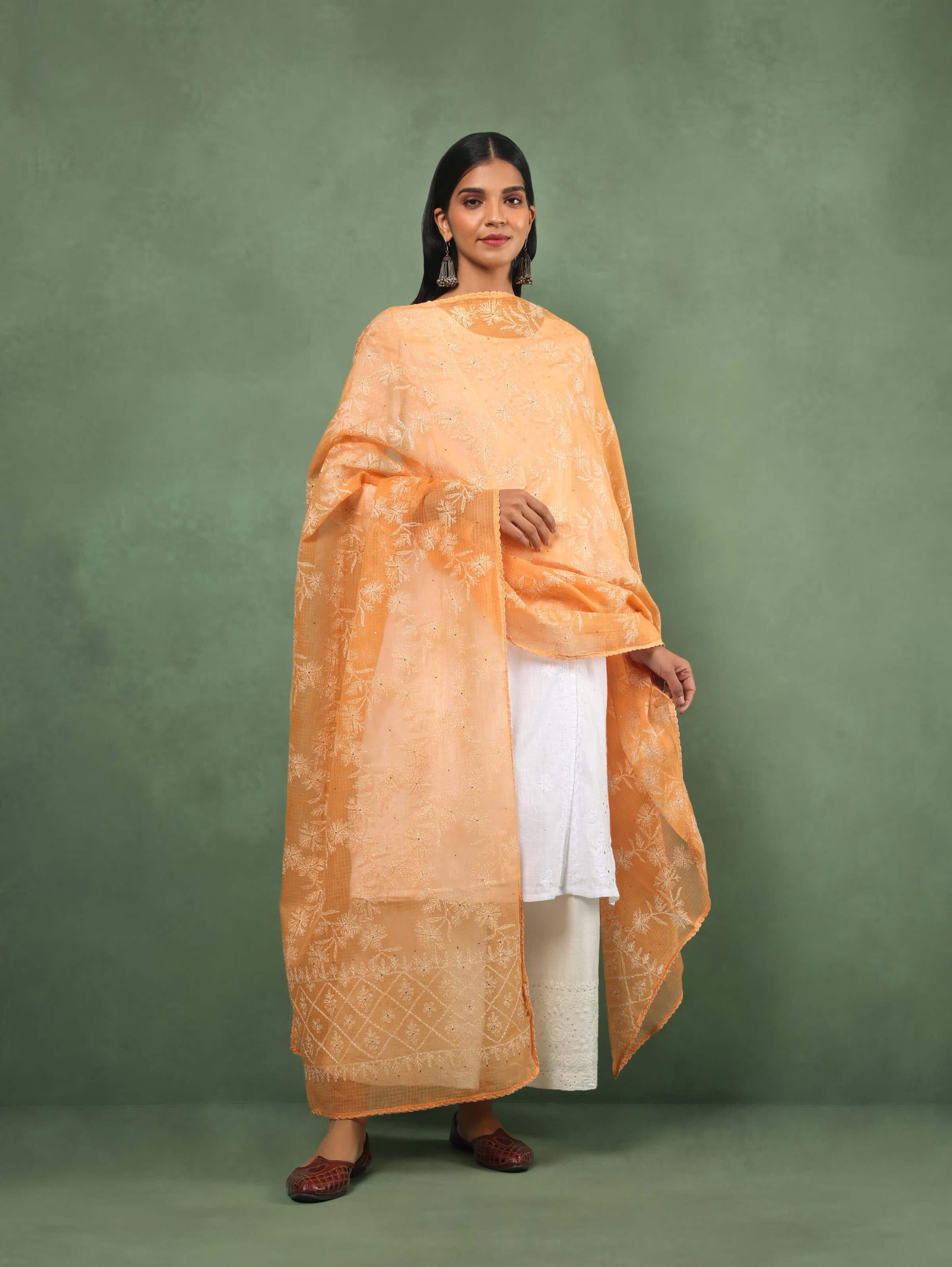 Lifestyle shot capturing the lightweight texture and graceful drape, perfect for adding subtle charm to any outfit.