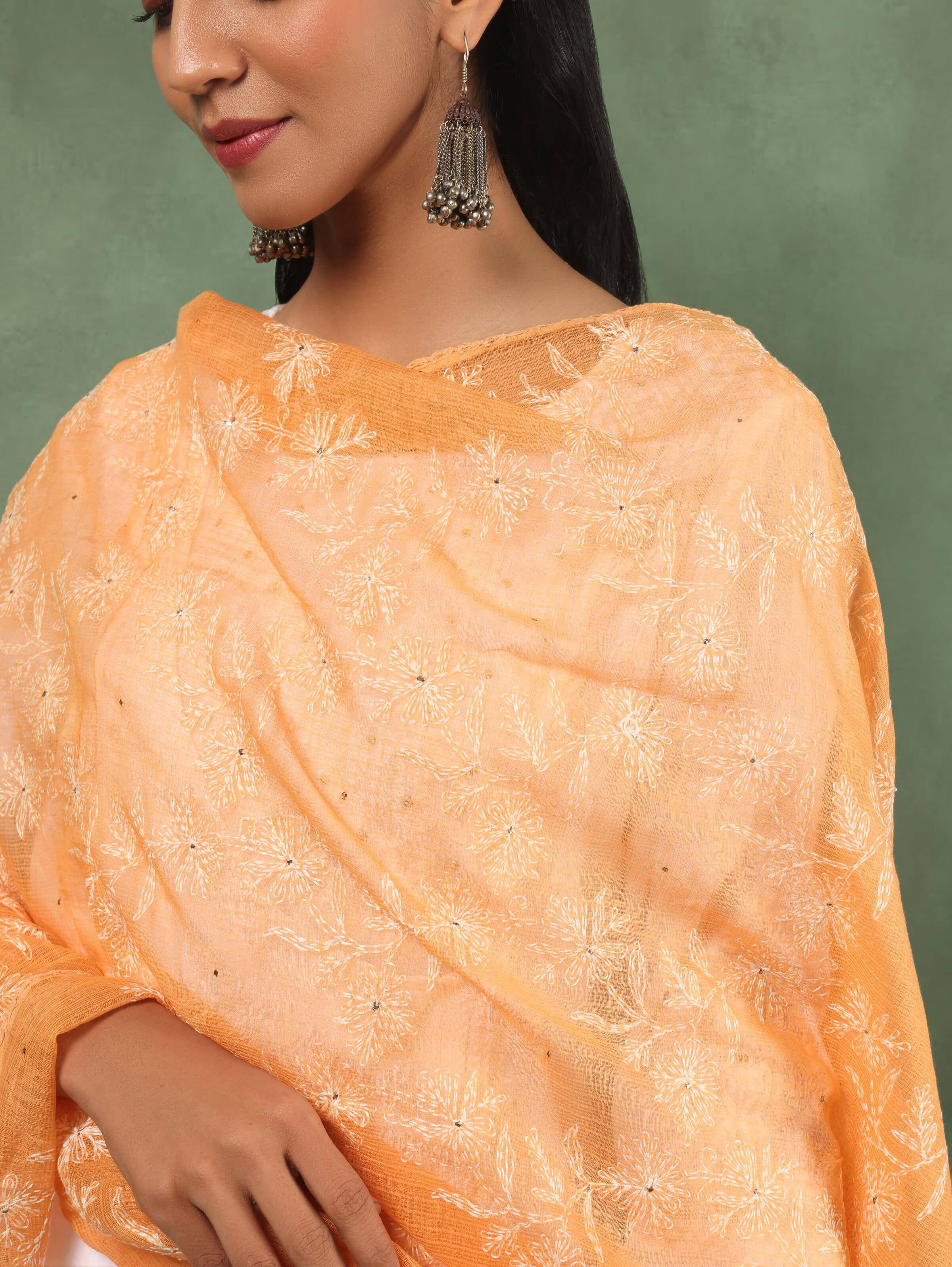 Another angle highlighting the fine embroidery details and the harmonious blend of colors.