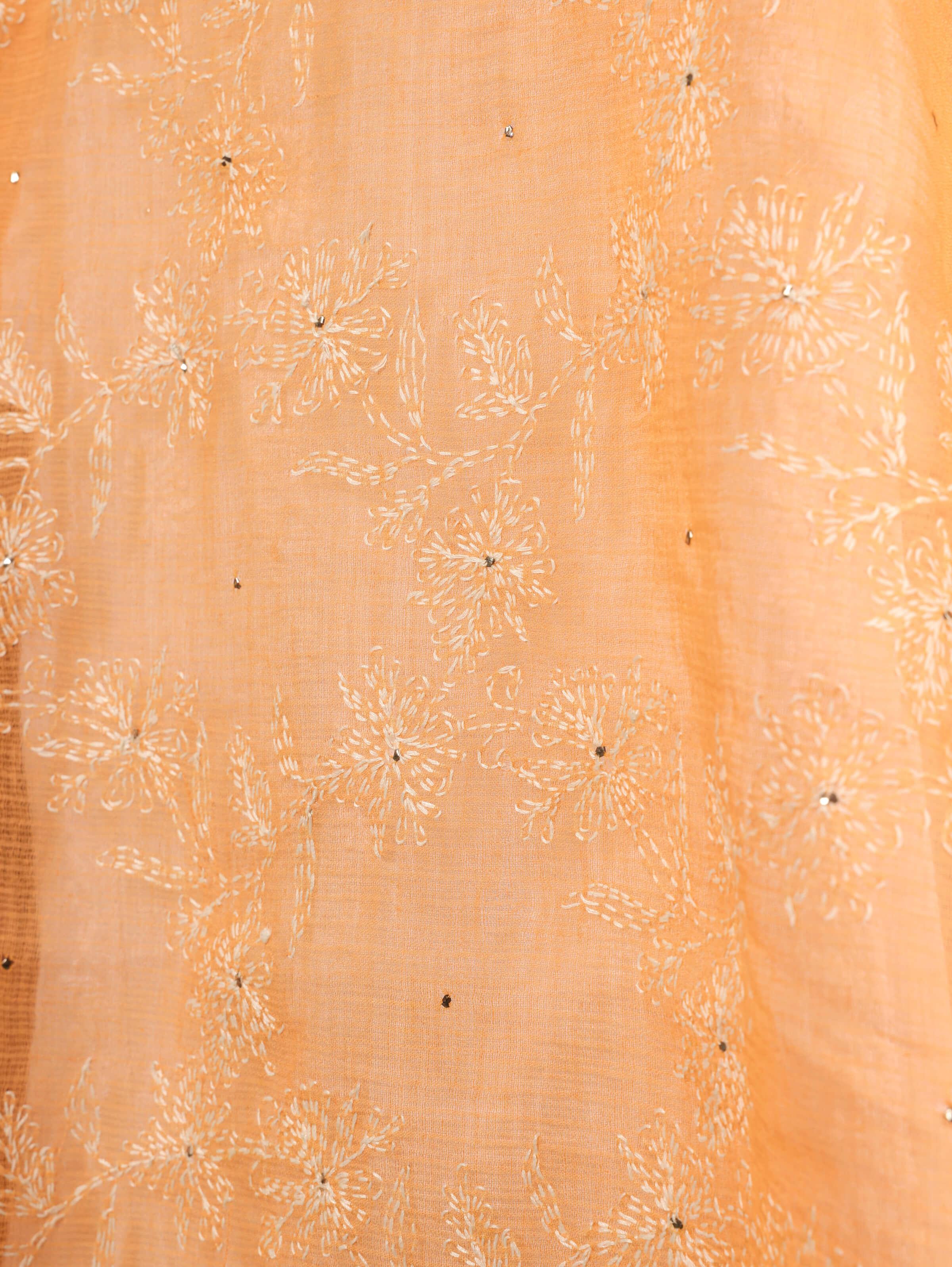 Side profile showcasing the smooth flow and exquisite craftsmanship of the fabric.