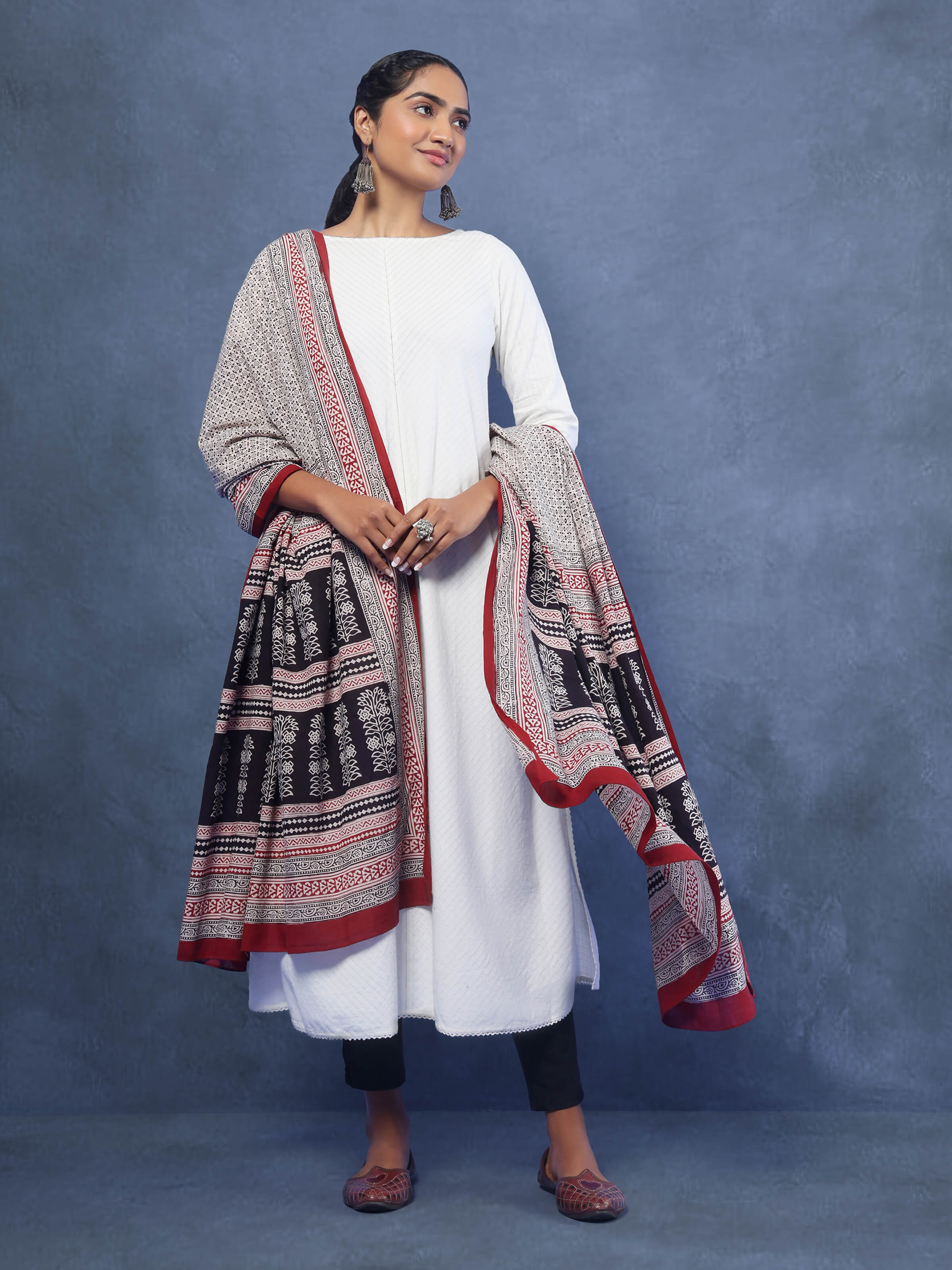 Lifestyle image showcasing the cotton stole draped elegantly over a model.
