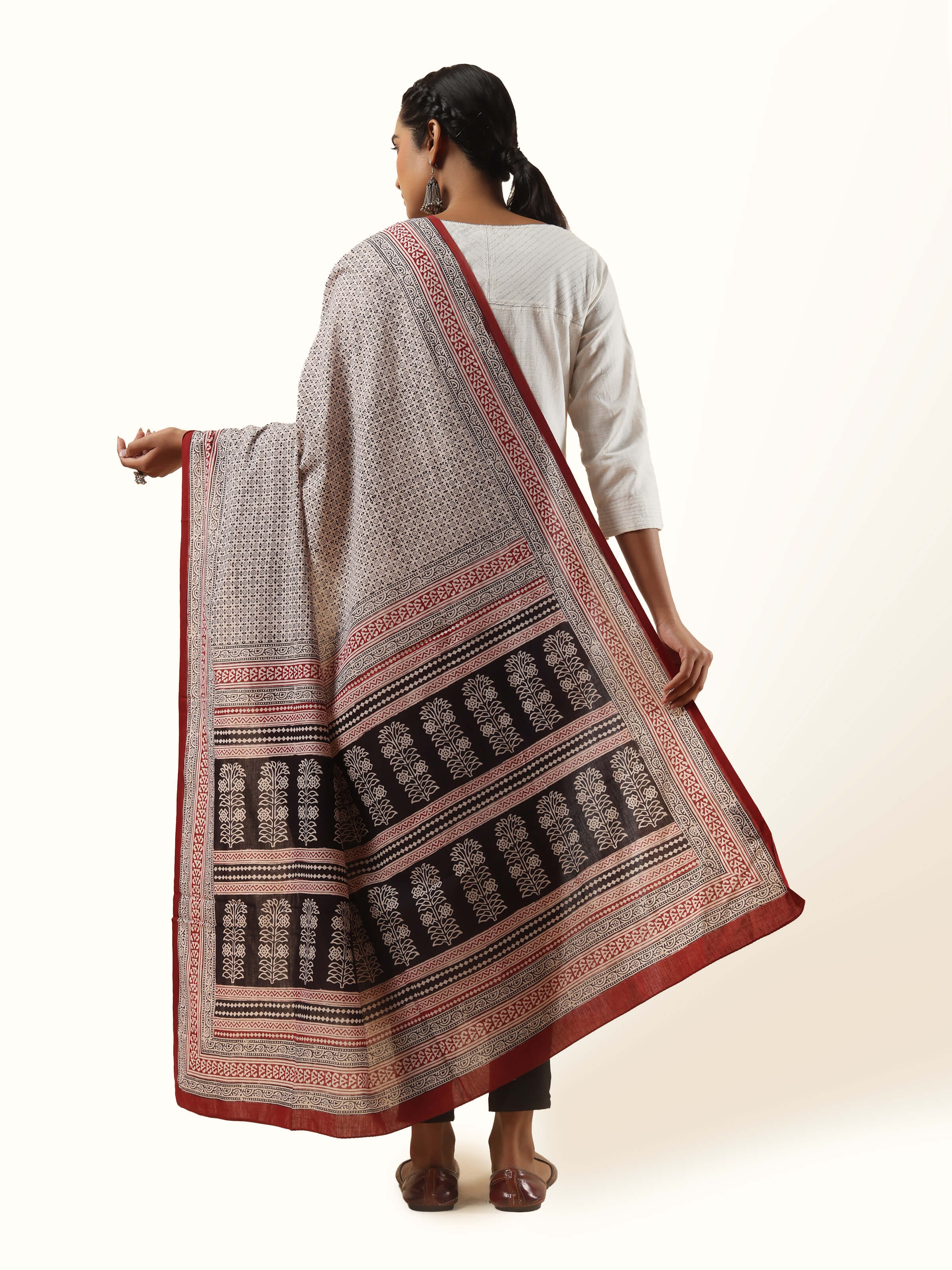 Back view showcasing the design continuity and fabric texture.