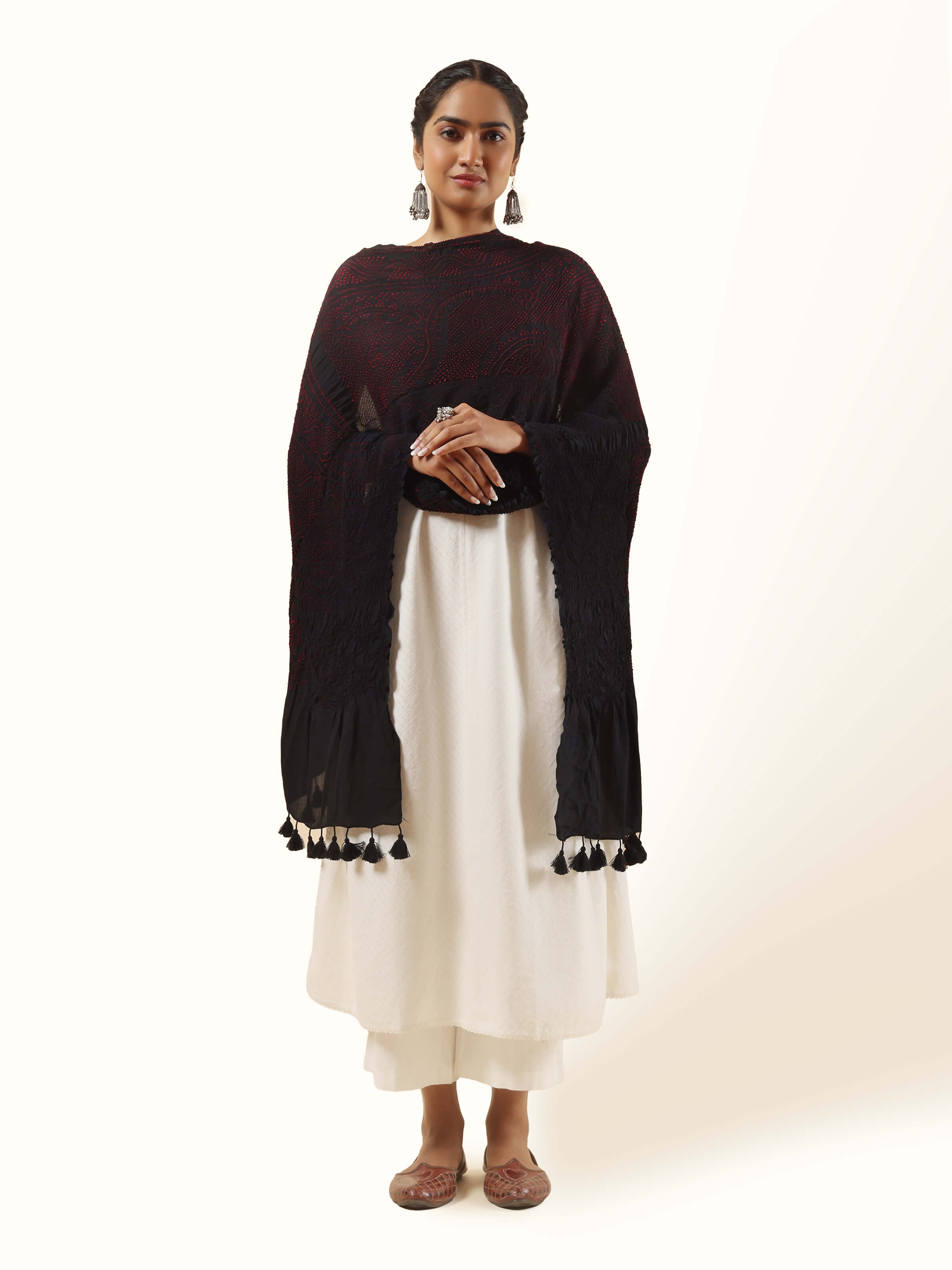 Front view of red silk Bandhani tie & dye dupatta featuring traditional white dotted patterns.