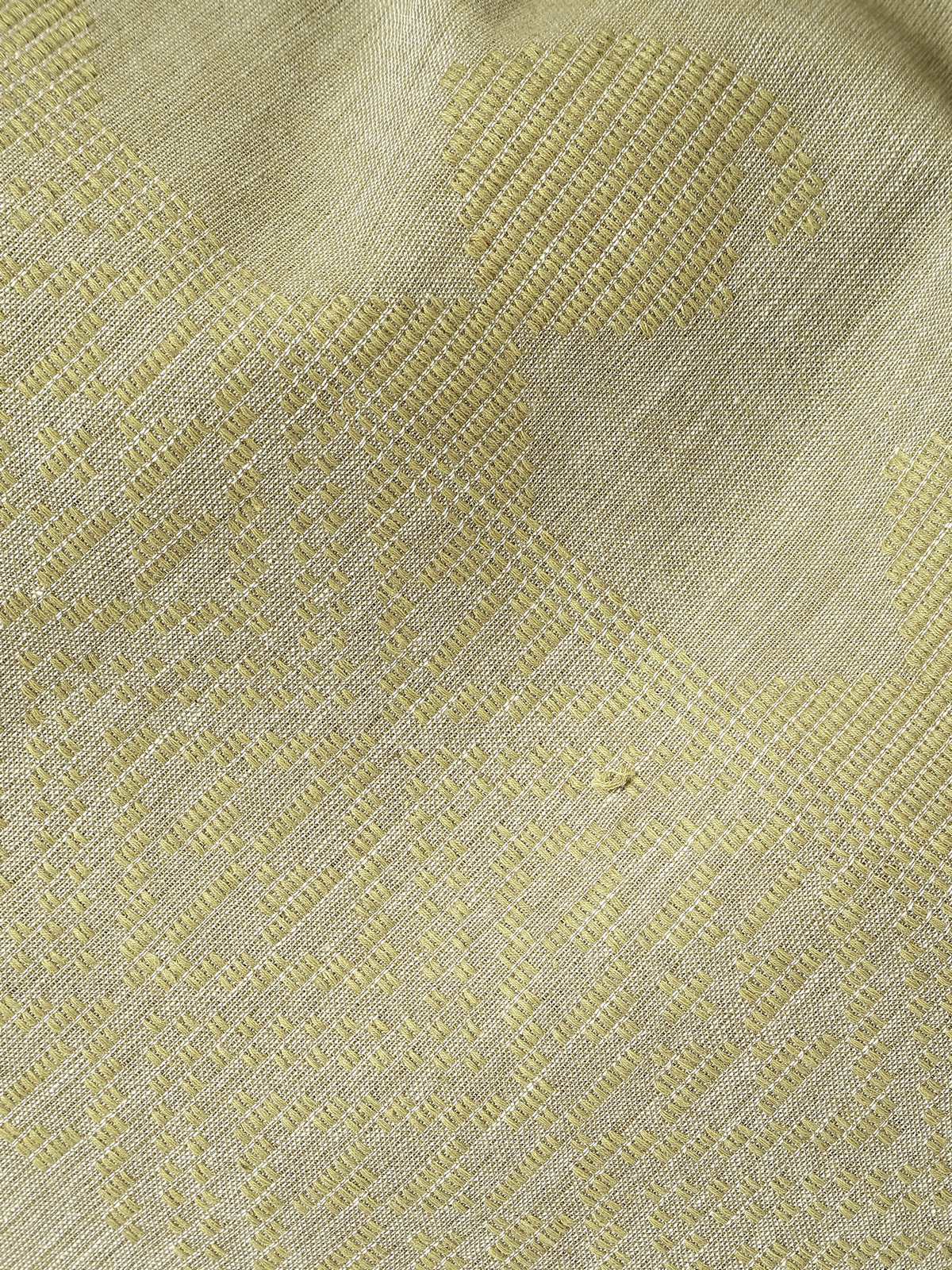 Folded yellow cotton extra-weft stole emphasizing its smooth finish and vibrant color.